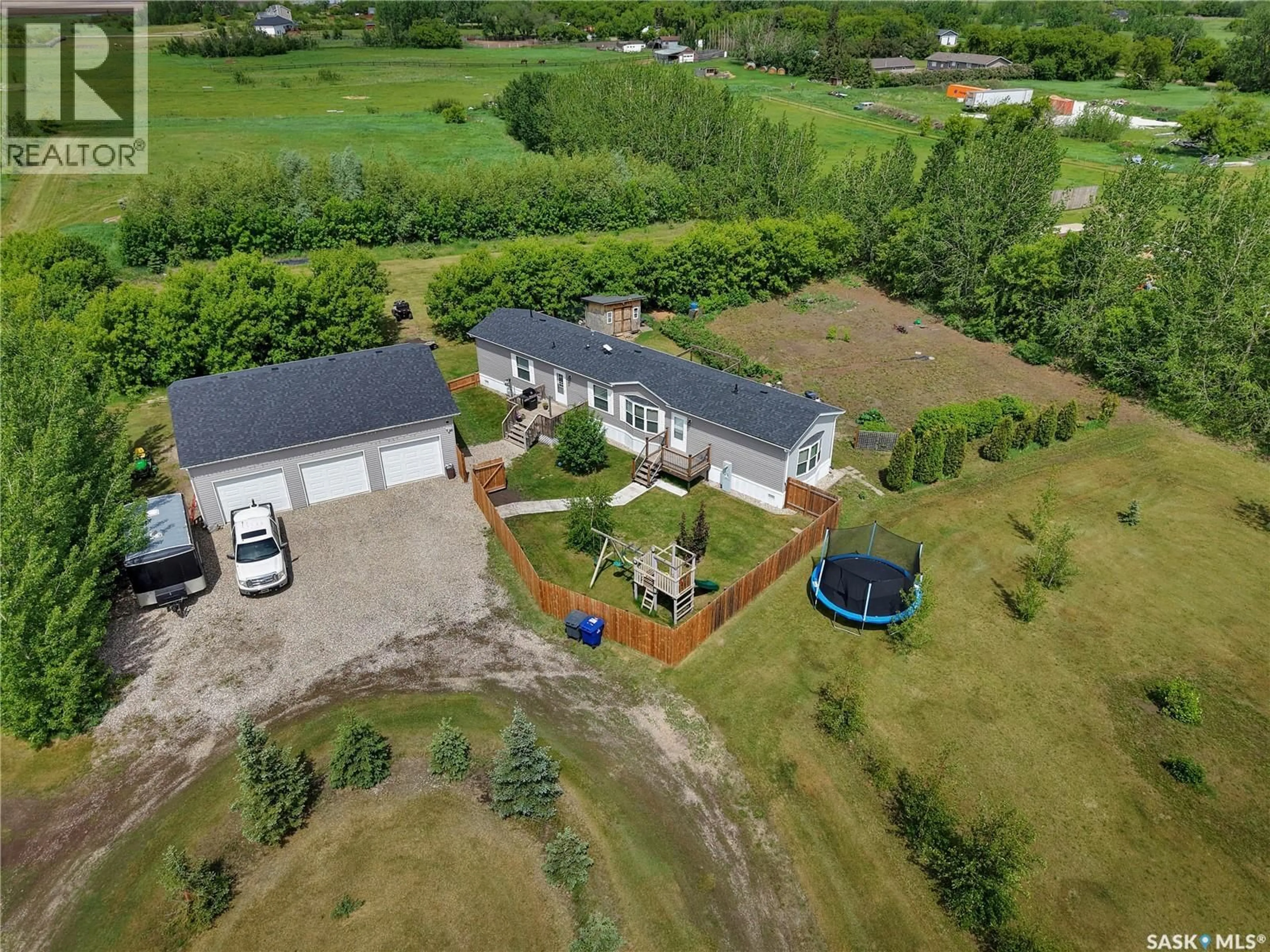 A pic from outside/outdoor area/front of a property/back of a property/a pic from drone, water/lake/river/ocean view for 321 BLUMENTHAL ACCESS RD, Rosthern Rm No. 403 Saskatchewan S0K1X0
