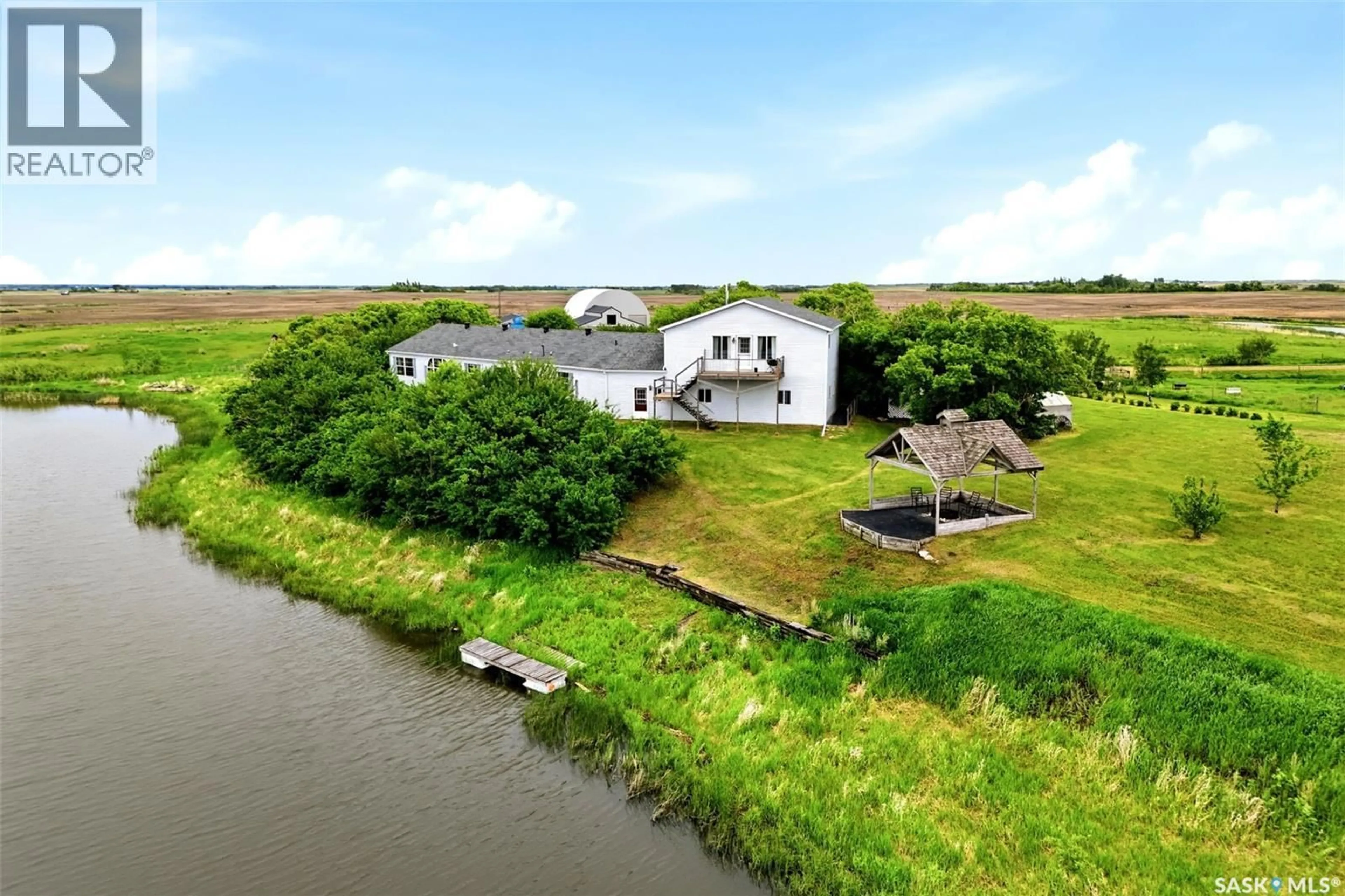 A pic from outside/outdoor area/front of a property/back of a property/a pic from drone, water/lake/river/ocean view for 70.67 SOUTHEY ACREAGE, Longlaketon Rm No. 219 Saskatchewan S0G4P0