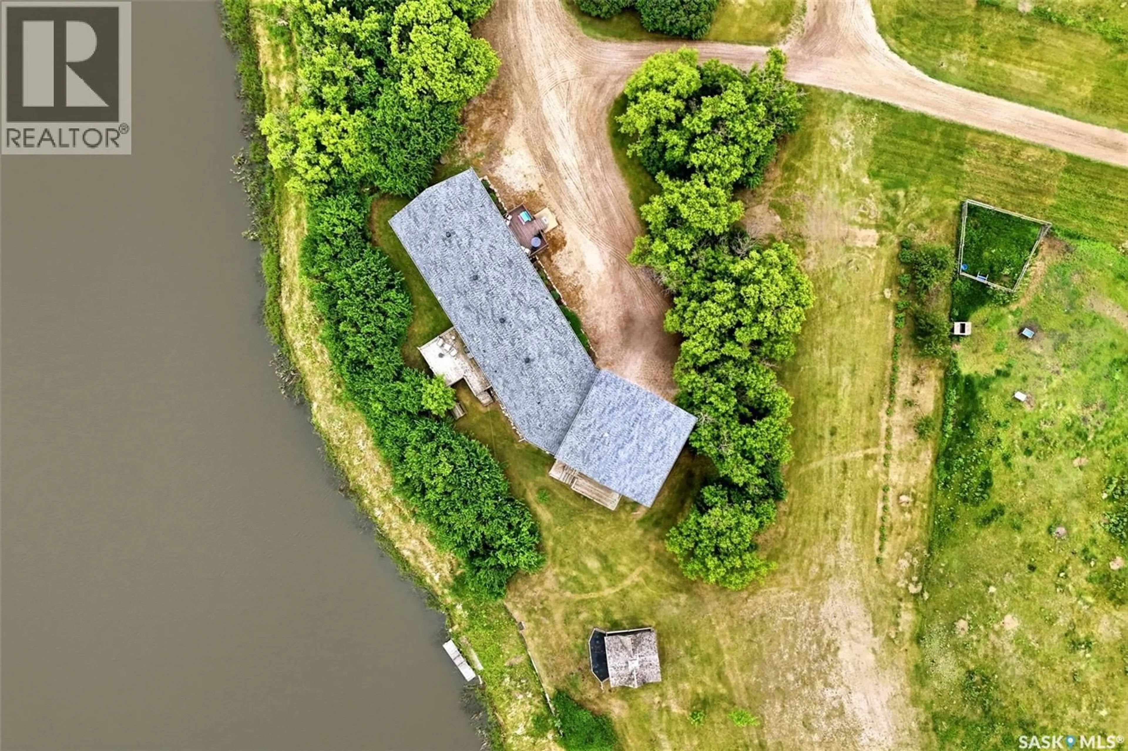 A pic from outside/outdoor area/front of a property/back of a property/a pic from drone, water/lake/river/ocean view for 70.67 SOUTHEY ACREAGE, Longlaketon Rm No. 219 Saskatchewan S0G4P0