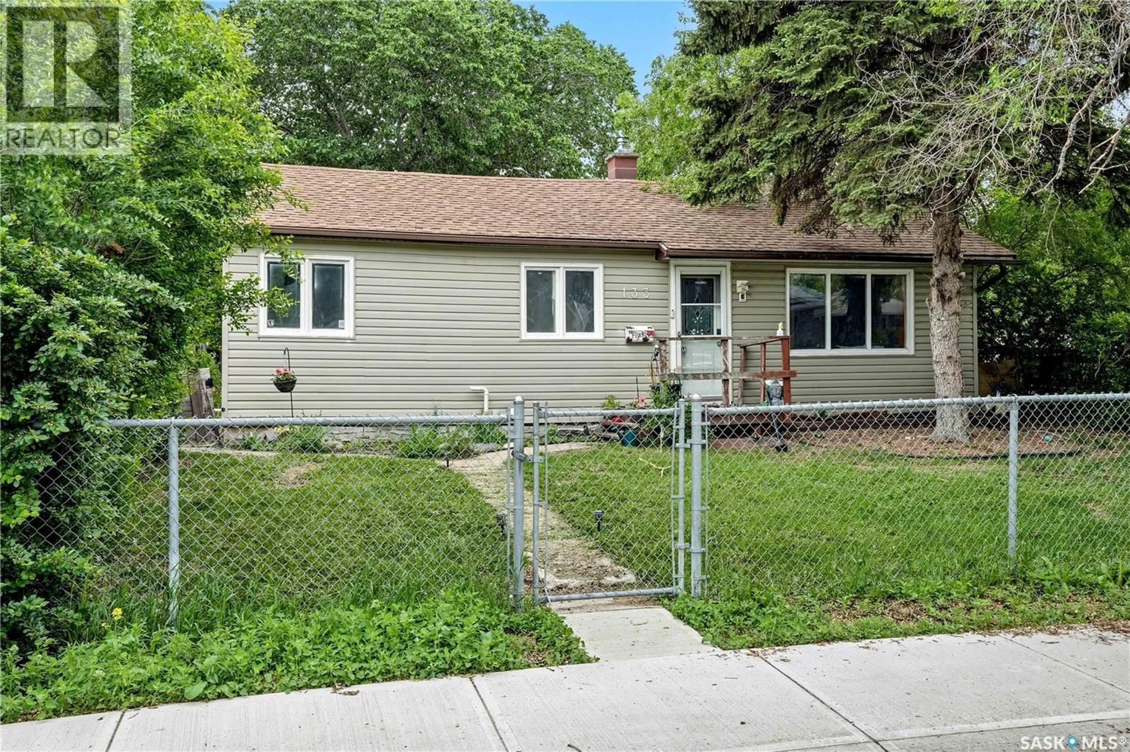 Home with vinyl exterior material, street for 133 OSLER STREET, Regina Saskatchewan S4R1V3