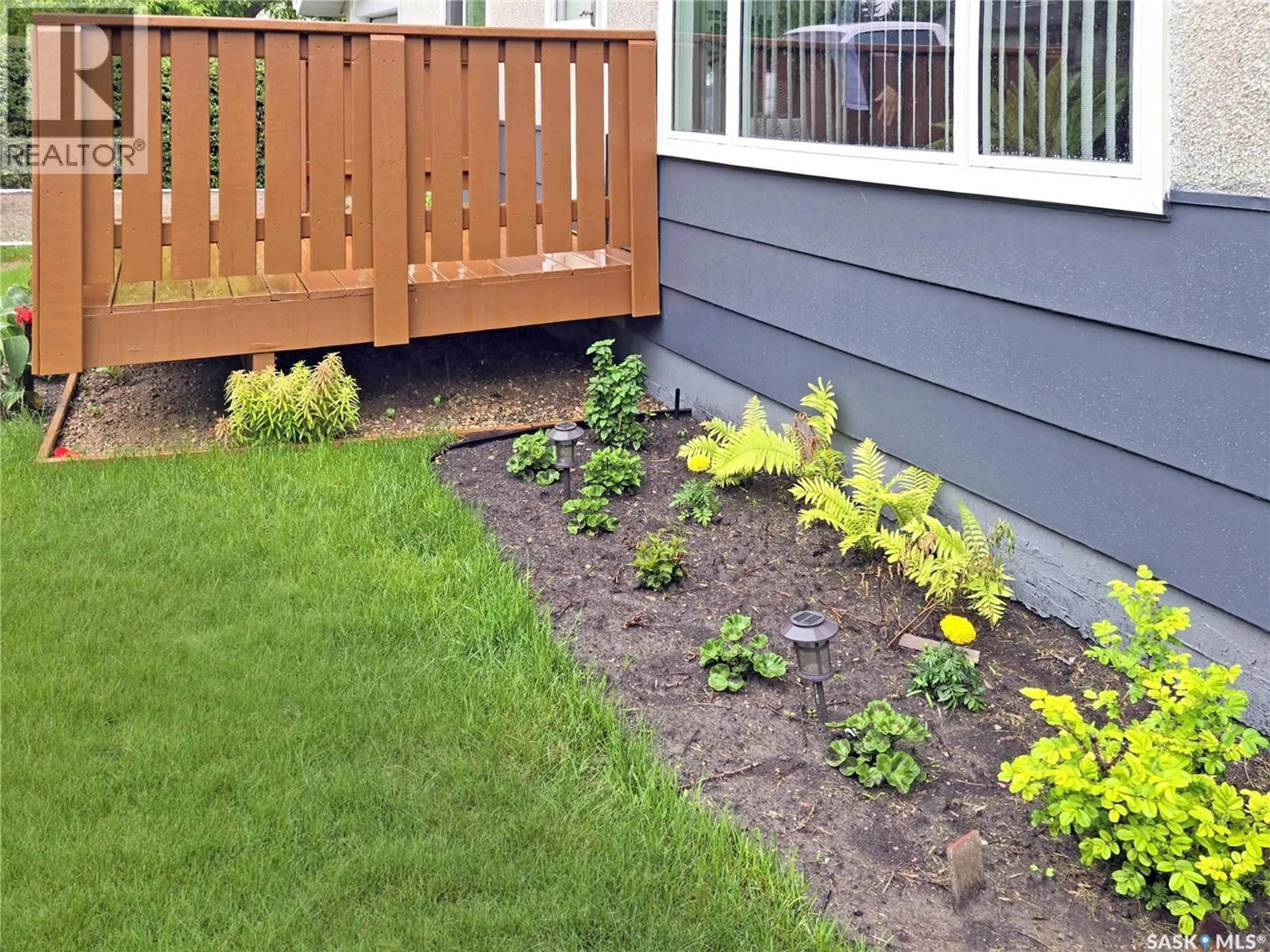 Patio, street for 203 WARK STREET, Dysart Saskatchewan S0G1H0