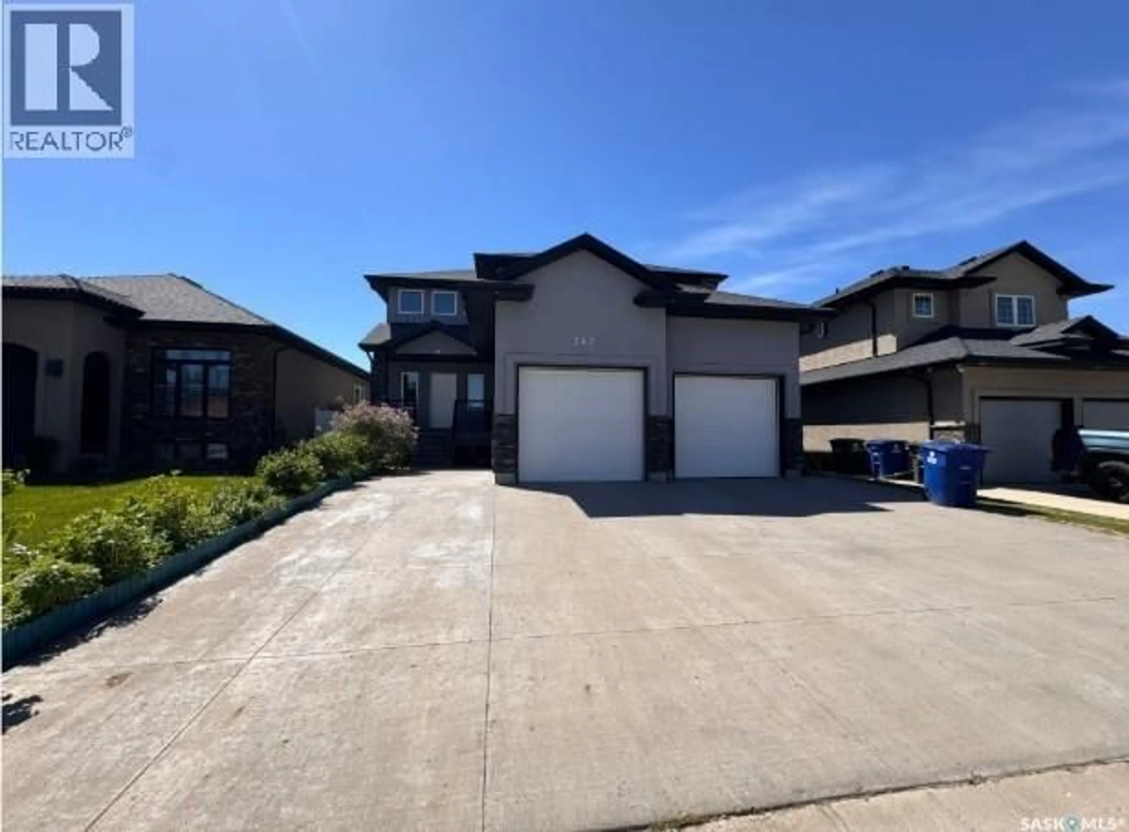 A pic from outside/outdoor area/front of a property/back of a property/a pic from drone, street for 242 POHORECKY STREET, Saskatoon Saskatchewan S7W0J3