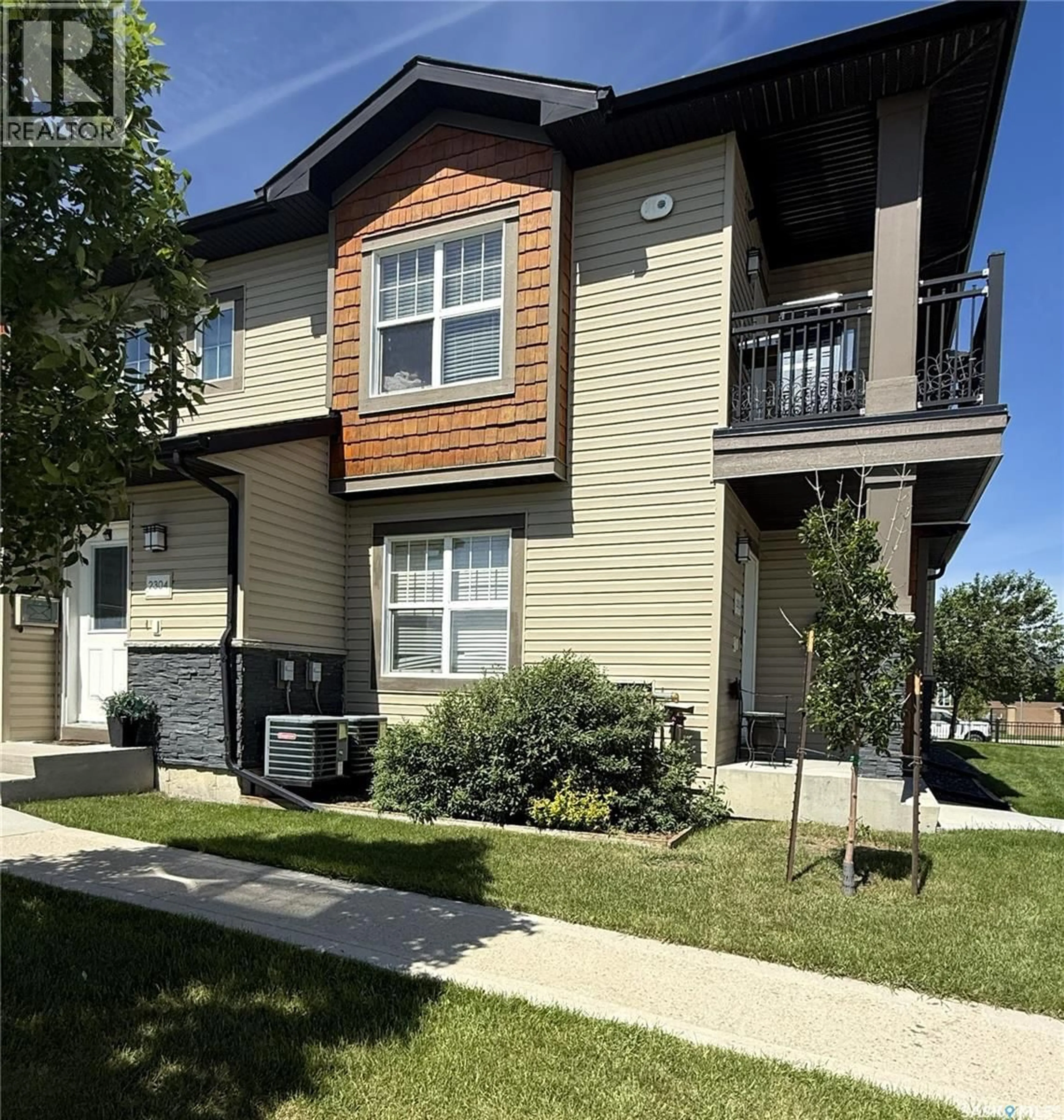 Home with vinyl exterior material, street for 1015 - 2304 PATRICK CRESCENT, Saskatoon Saskatchewan S7W0M1