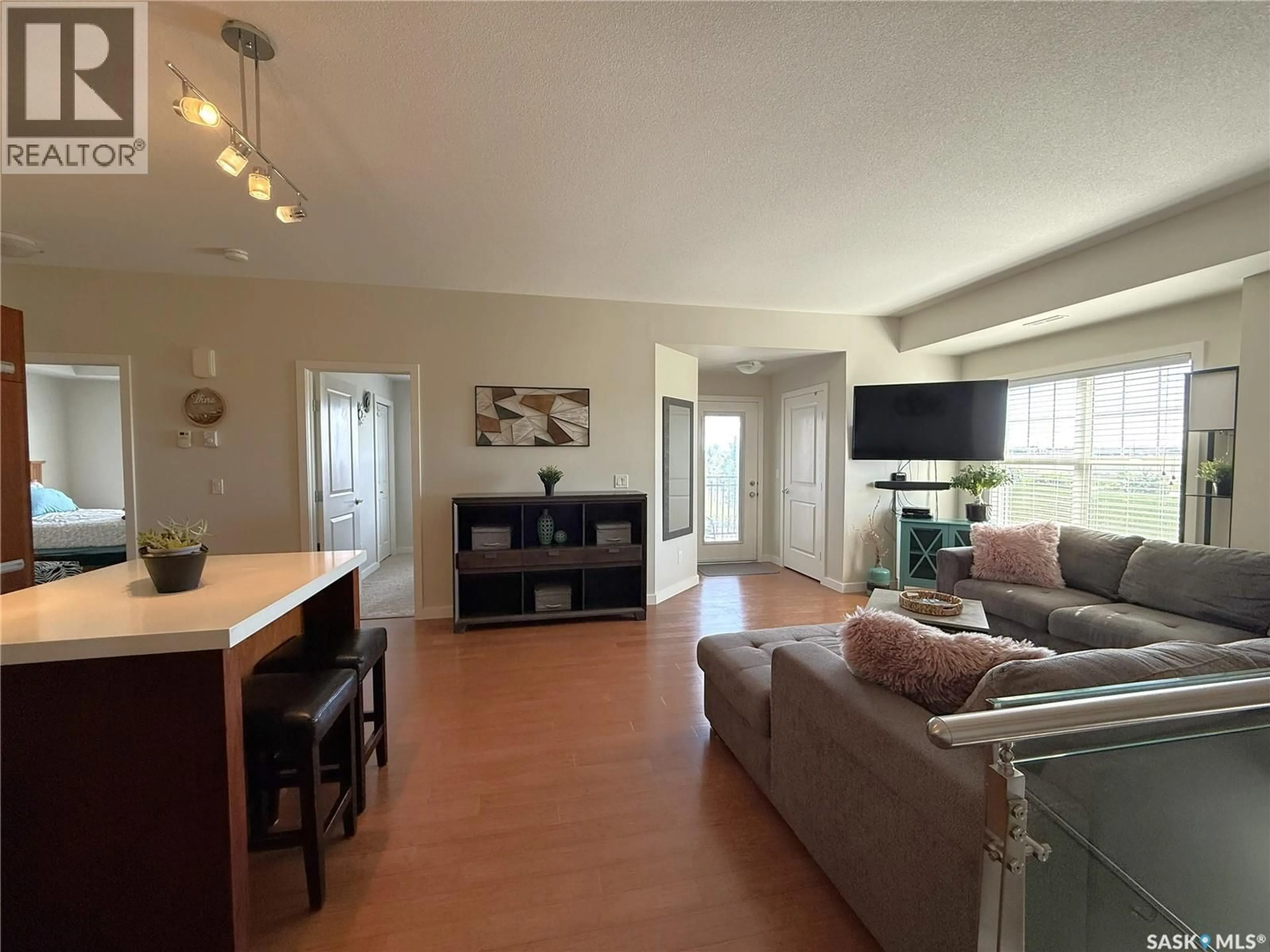 Living room with furniture, unknown for 1015 - 2304 PATRICK CRESCENT, Saskatoon Saskatchewan S7W0M1
