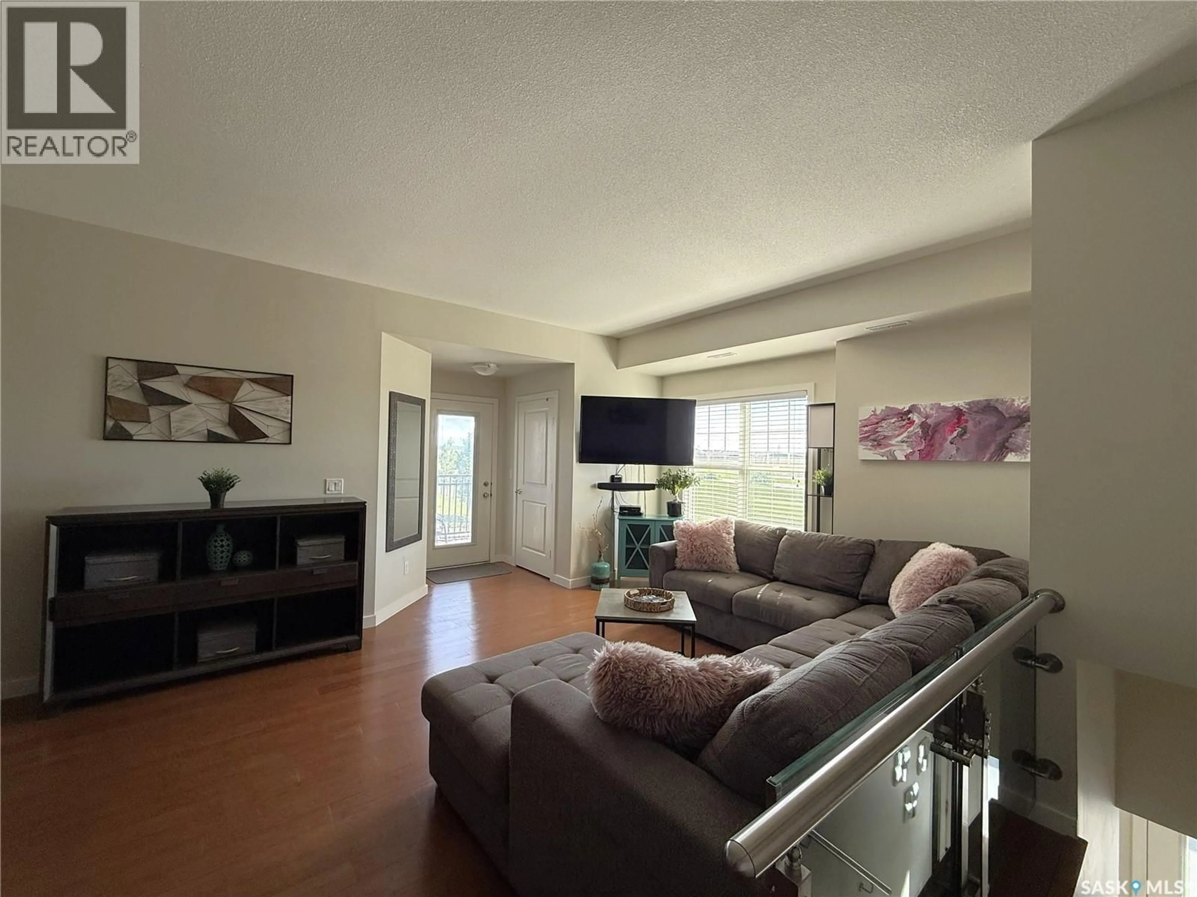 Living room with furniture, unknown for 1015 - 2304 PATRICK CRESCENT, Saskatoon Saskatchewan S7W0M1