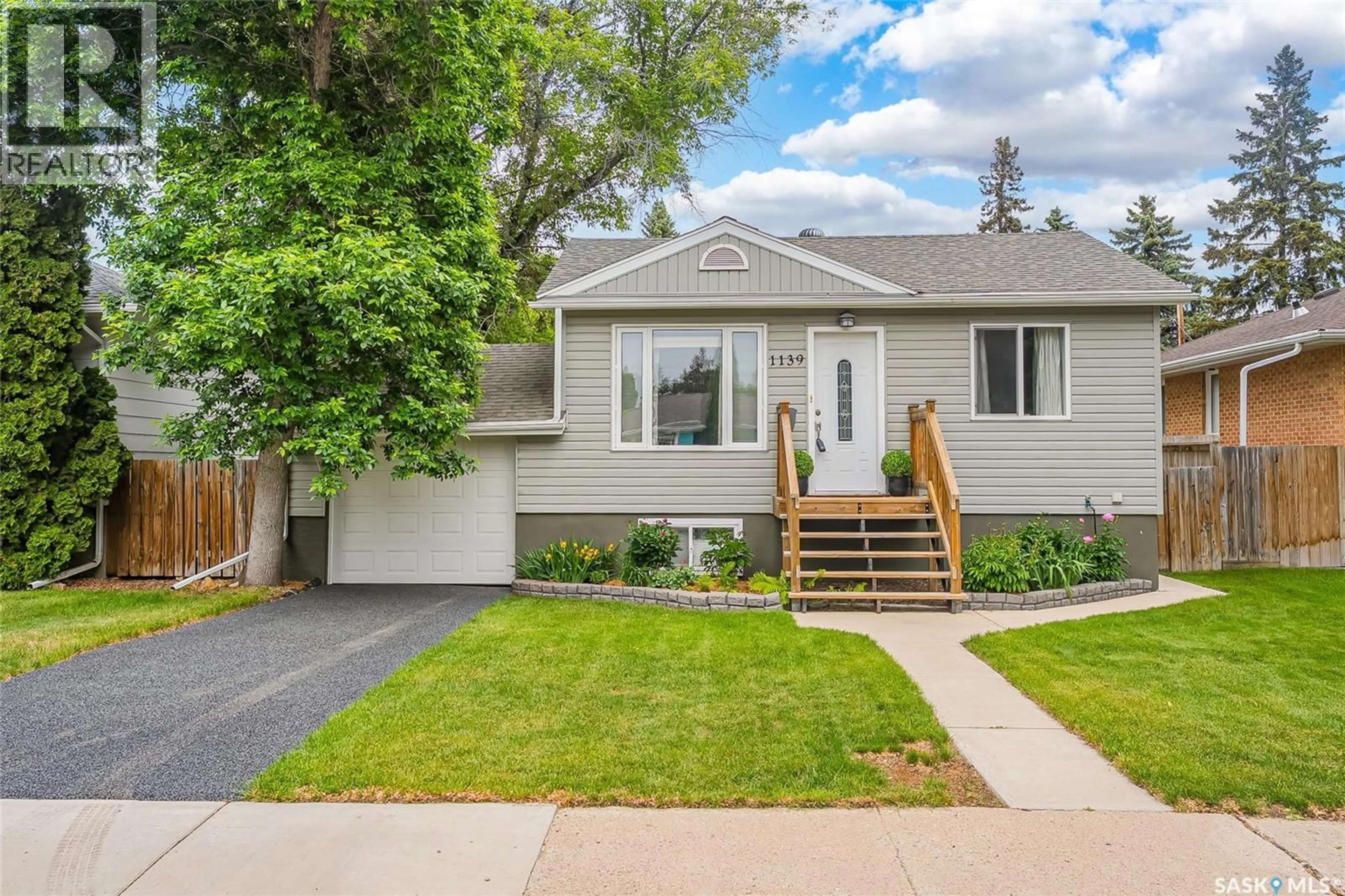 Home with vinyl exterior material, street for 1139 2ND STREET, Saskatoon Saskatchewan S7H1R4