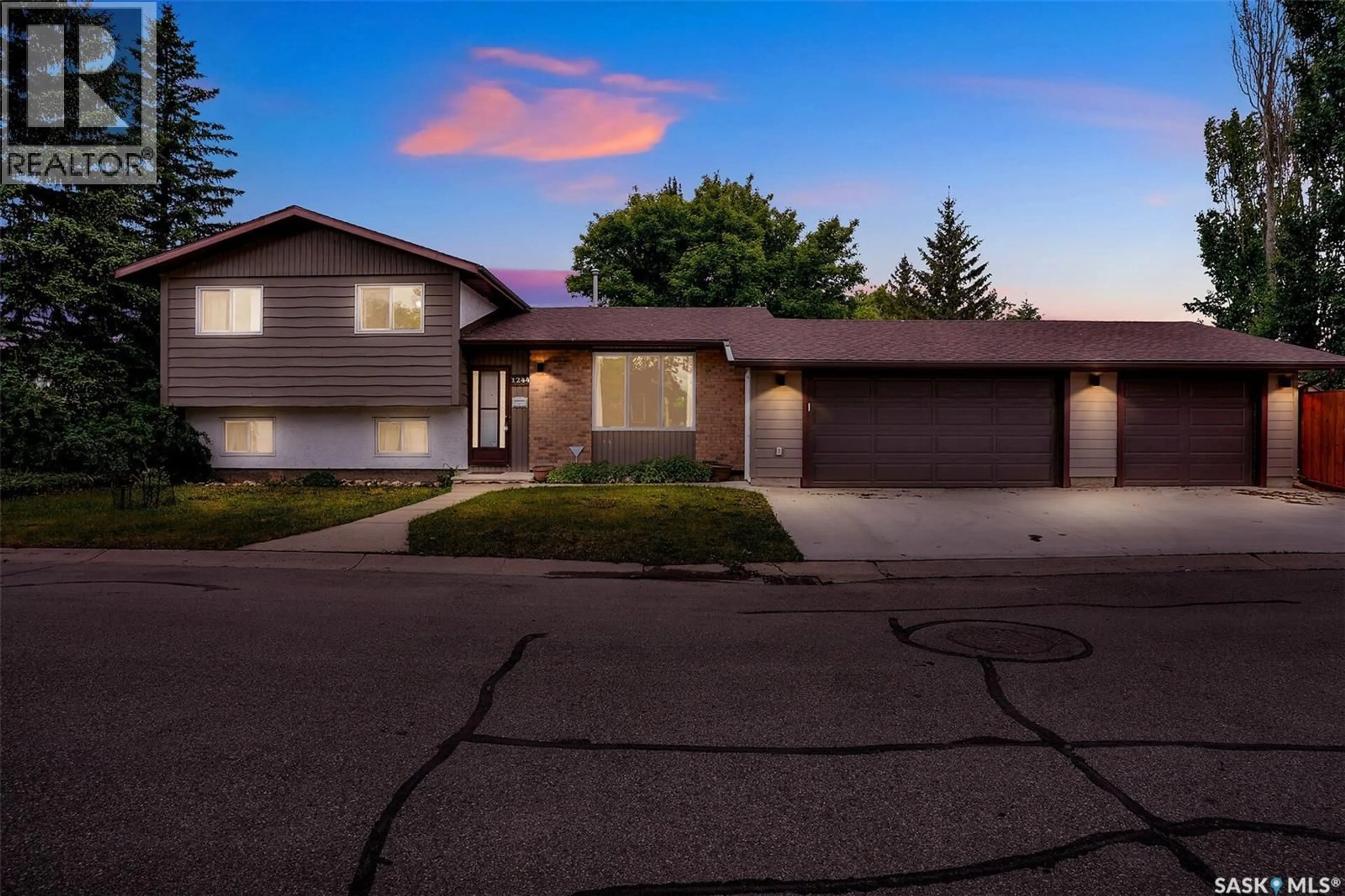 Home with vinyl exterior material, street for 1244 RUNCIMAN CRESCENT, Regina Saskatchewan S4X3A8