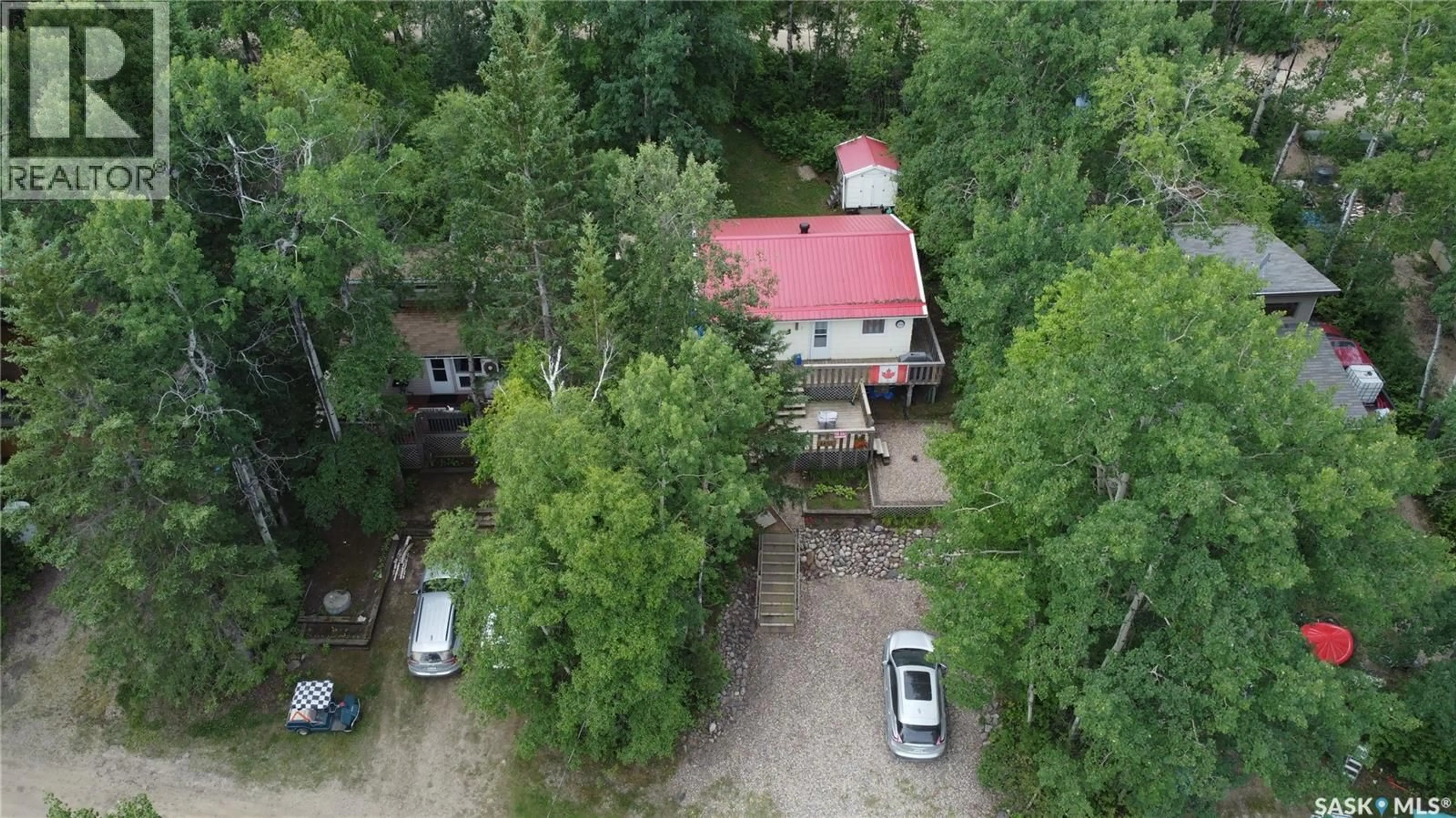 A pic from outside/outdoor area/front of a property/back of a property/a pic from drone, forest/trees view for 1100 LAKESIDE ROAD, Marean Lake Saskatchewan S0E0R0