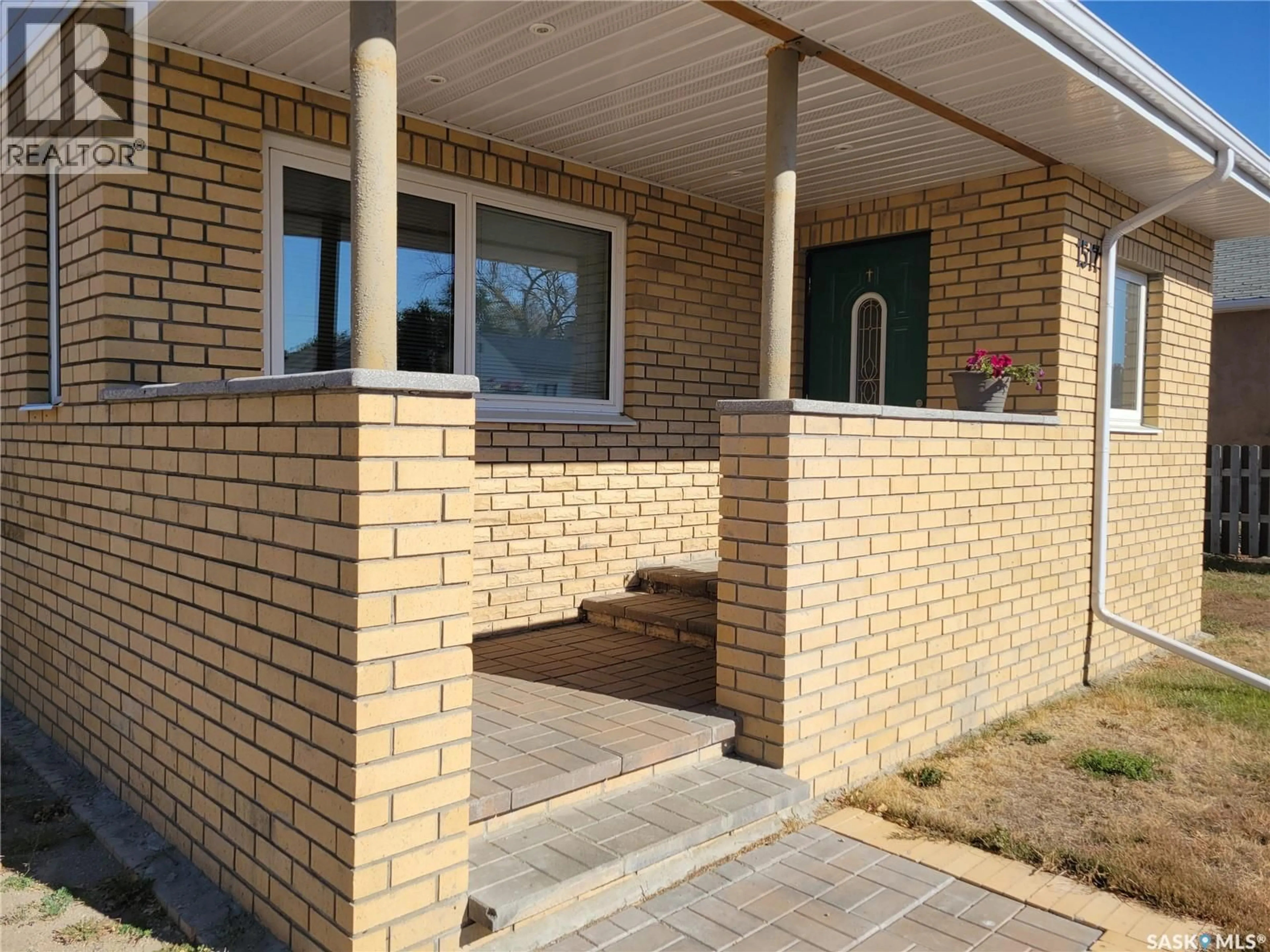 Home with brick exterior material, street for 1517 3RD STREET, Estevan Saskatchewan S4A0S5