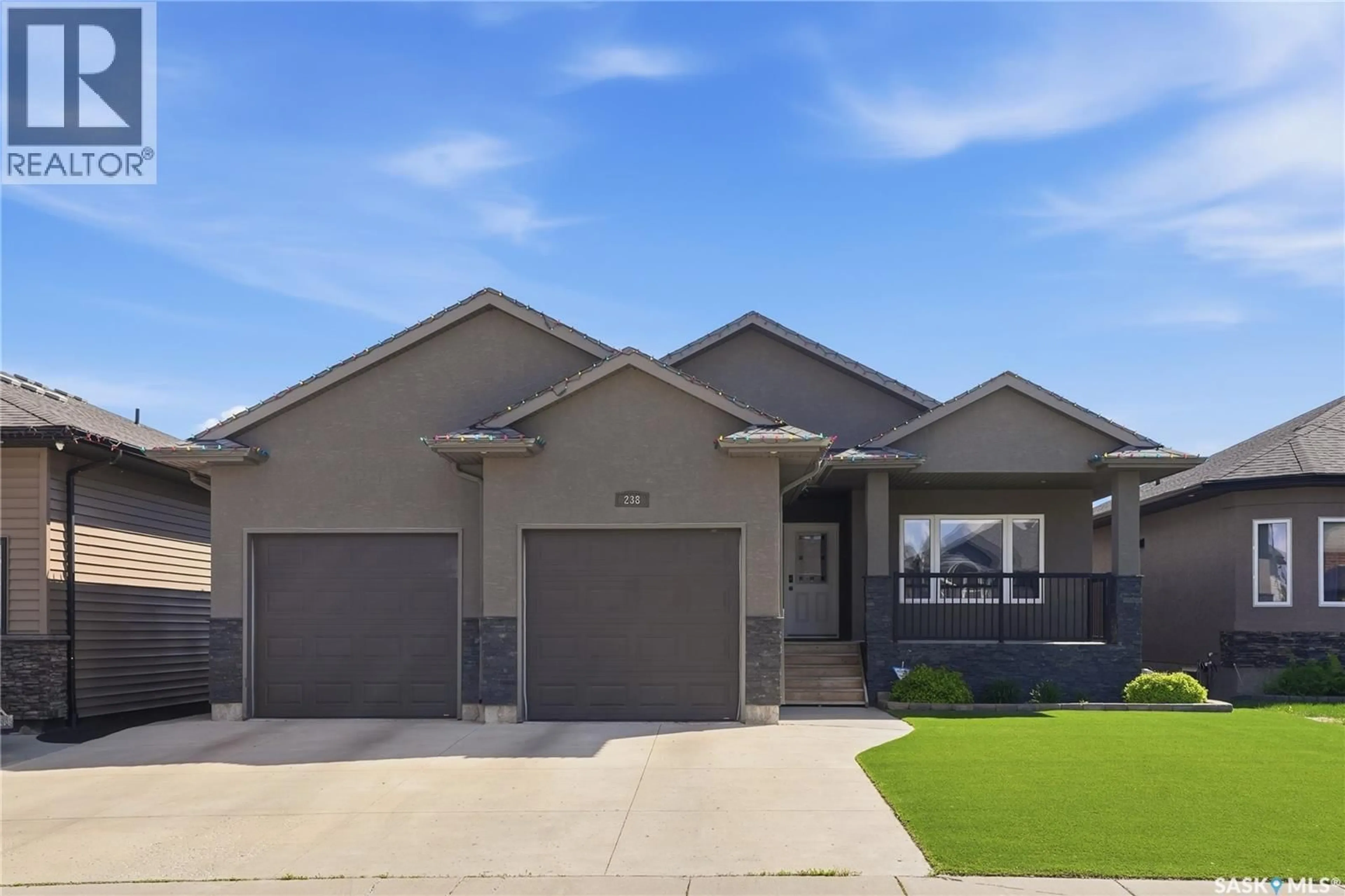 Home with vinyl exterior material, street for 238 GREENFIELD CRESCENT, Saskatoon Saskatchewan S7R0B6