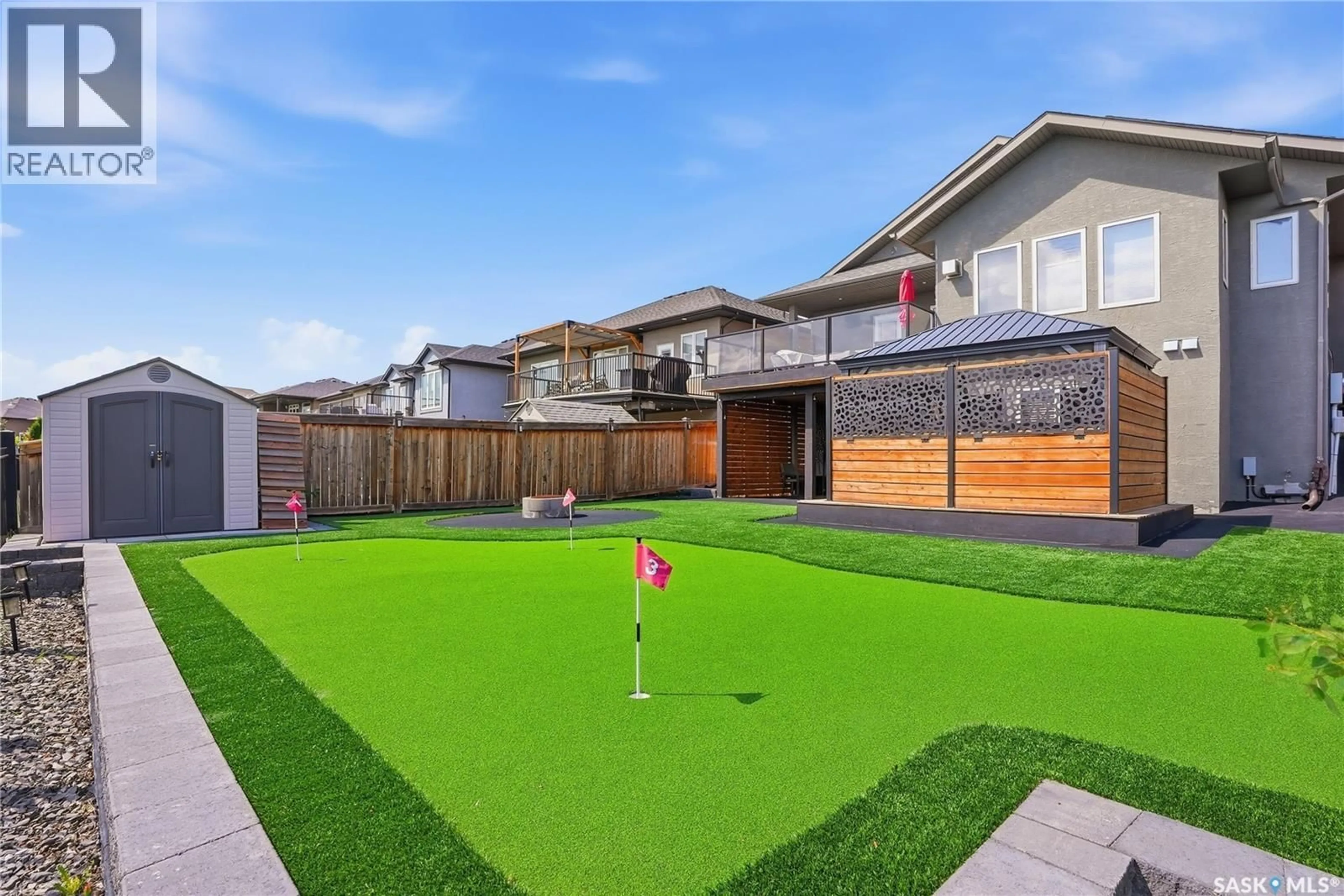 A pic from outside/outdoor area/front of a property/back of a property/a pic from drone, street for 238 GREENFIELD CRESCENT, Saskatoon Saskatchewan S7R0B6