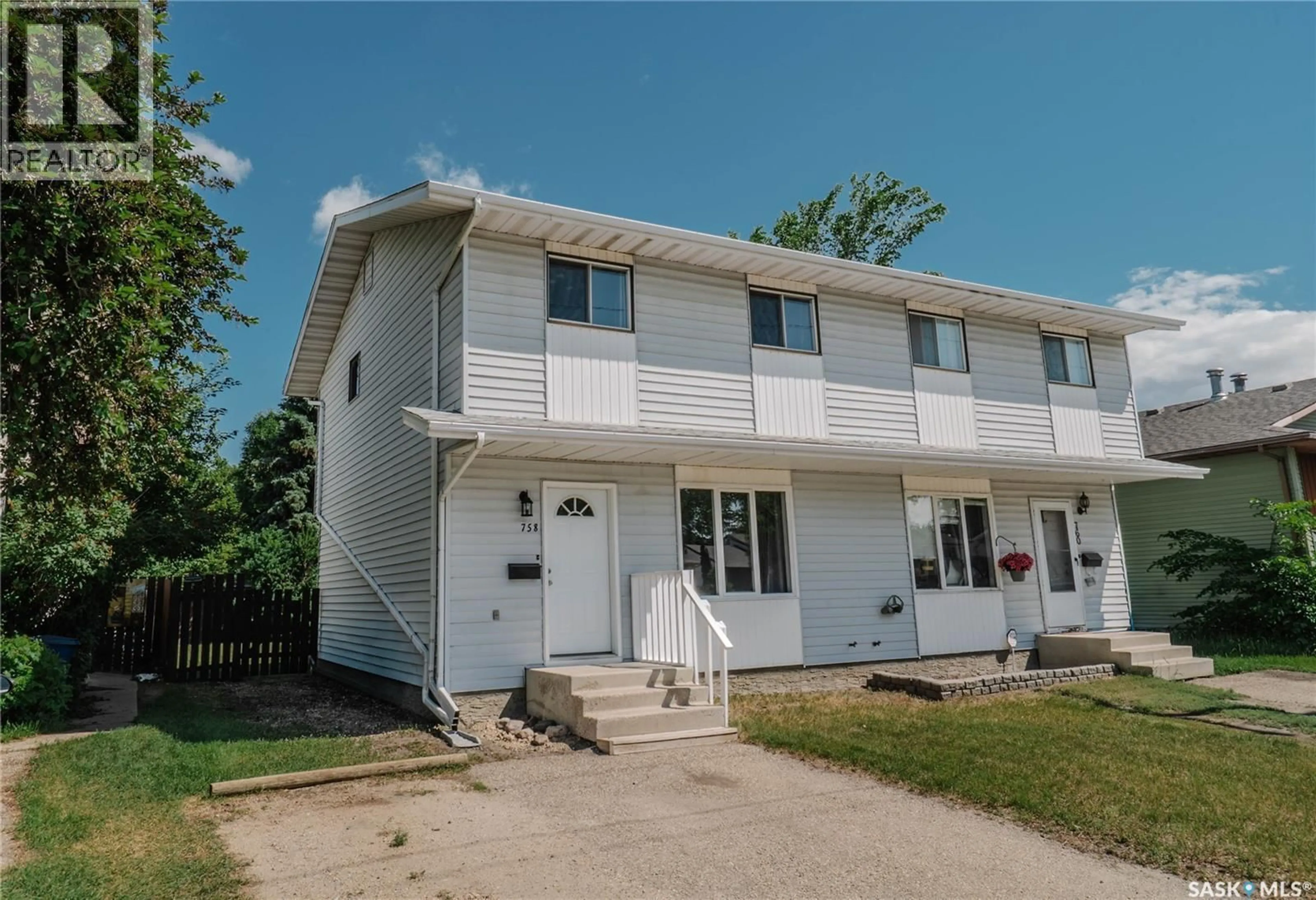 Home with vinyl exterior material, street for 758 LENORE DRIVE, Saskatoon Saskatchewan S7K6A8