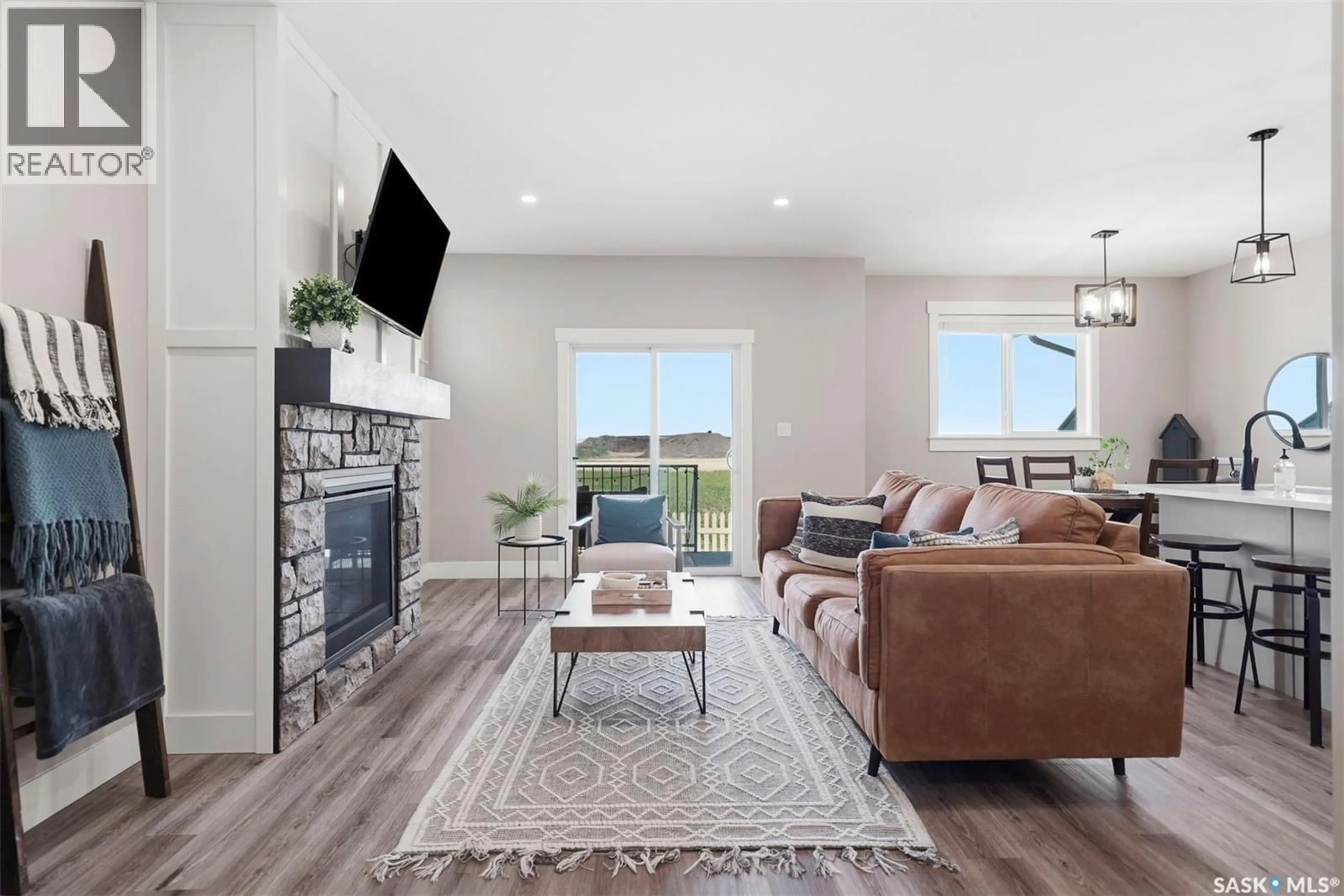 Living room with furniture, unknown for 85 900 ST ANDREWS LANE, Warman Saskatchewan S0K4S4