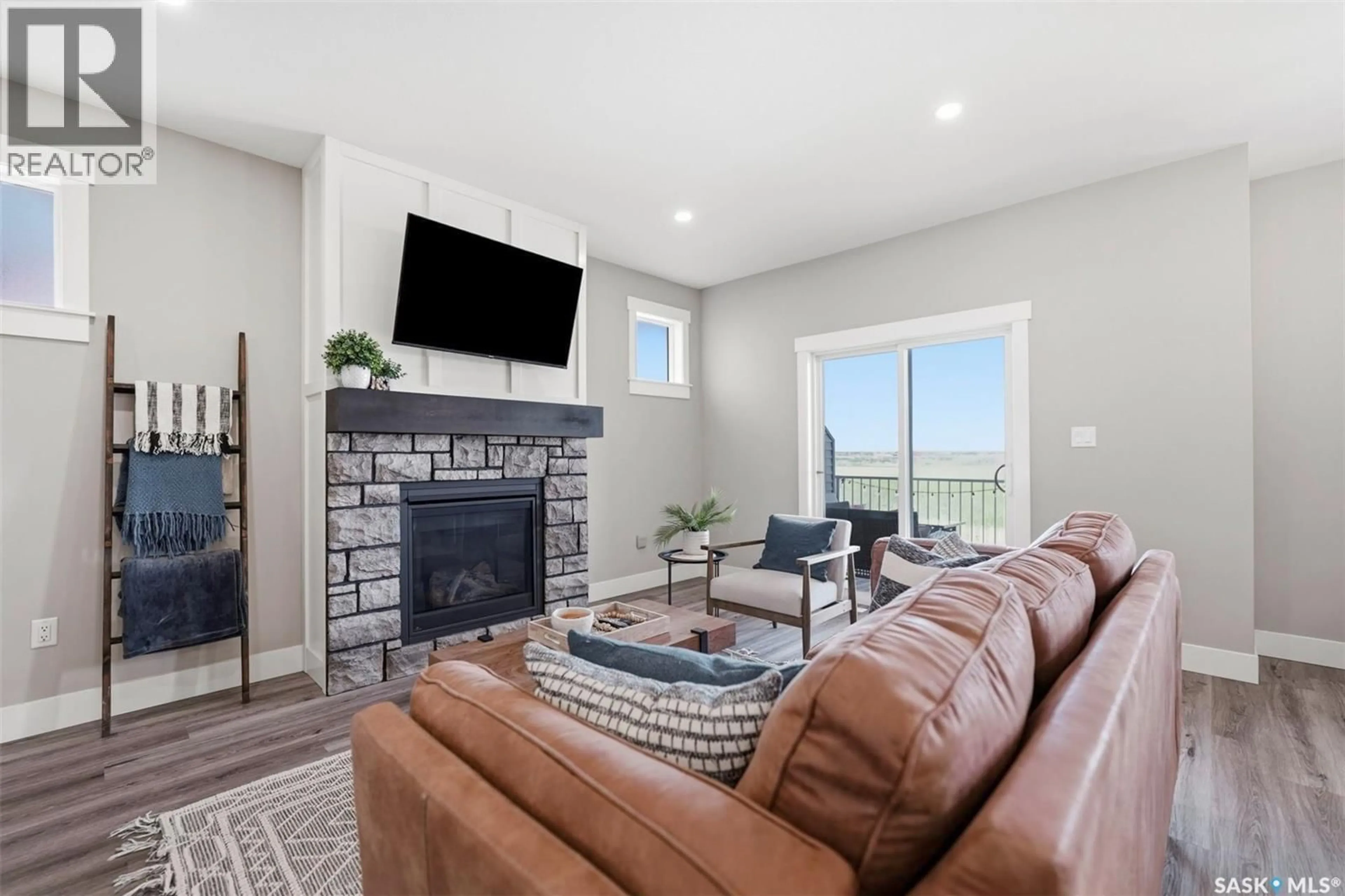 Living room with furniture, unknown for 85 900 ST ANDREWS LANE, Warman Saskatchewan S0K4S4