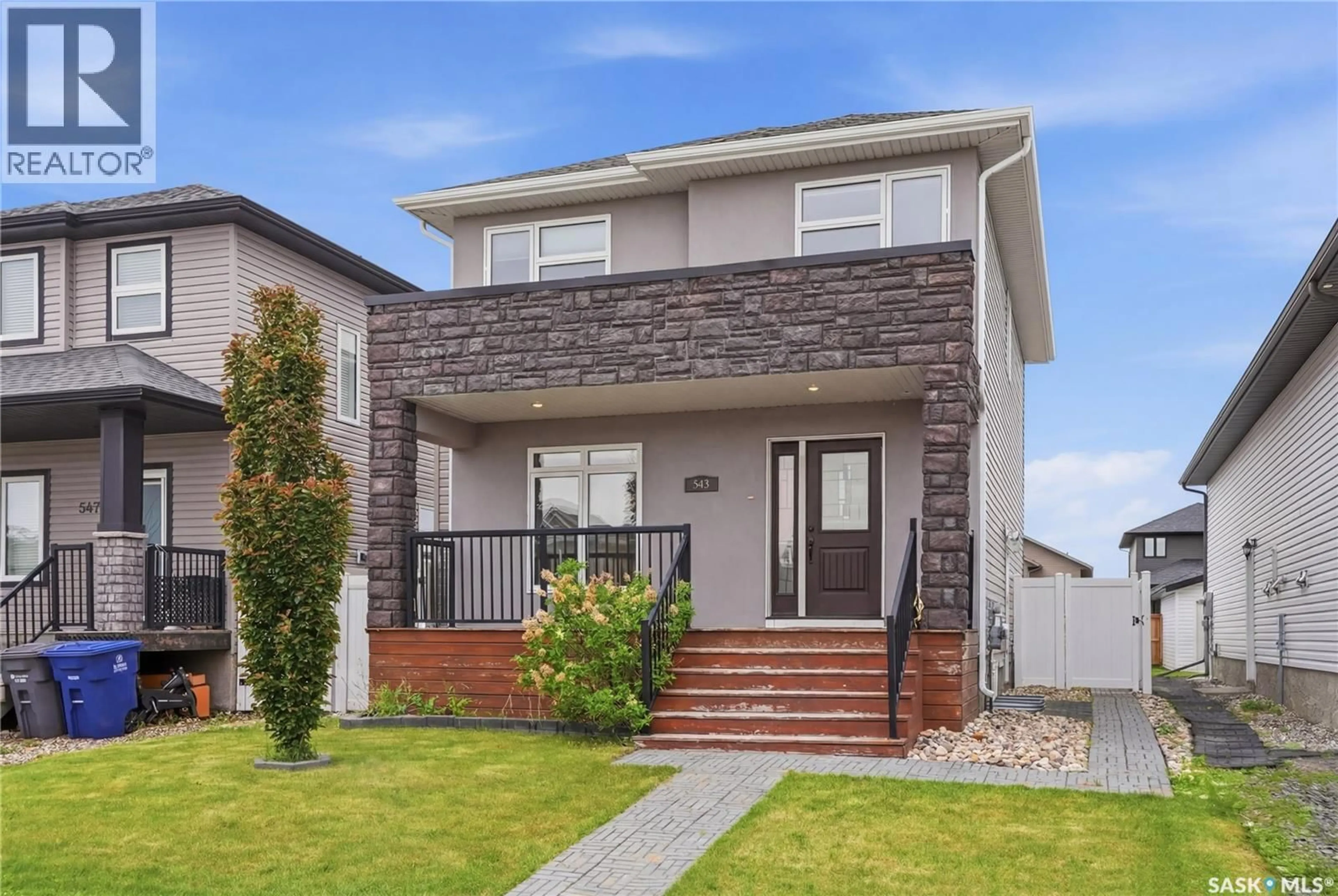 Home with brick exterior material, street for 543 EVERGREEN BOULEVARD, Saskatoon Saskatchewan S7W0L4