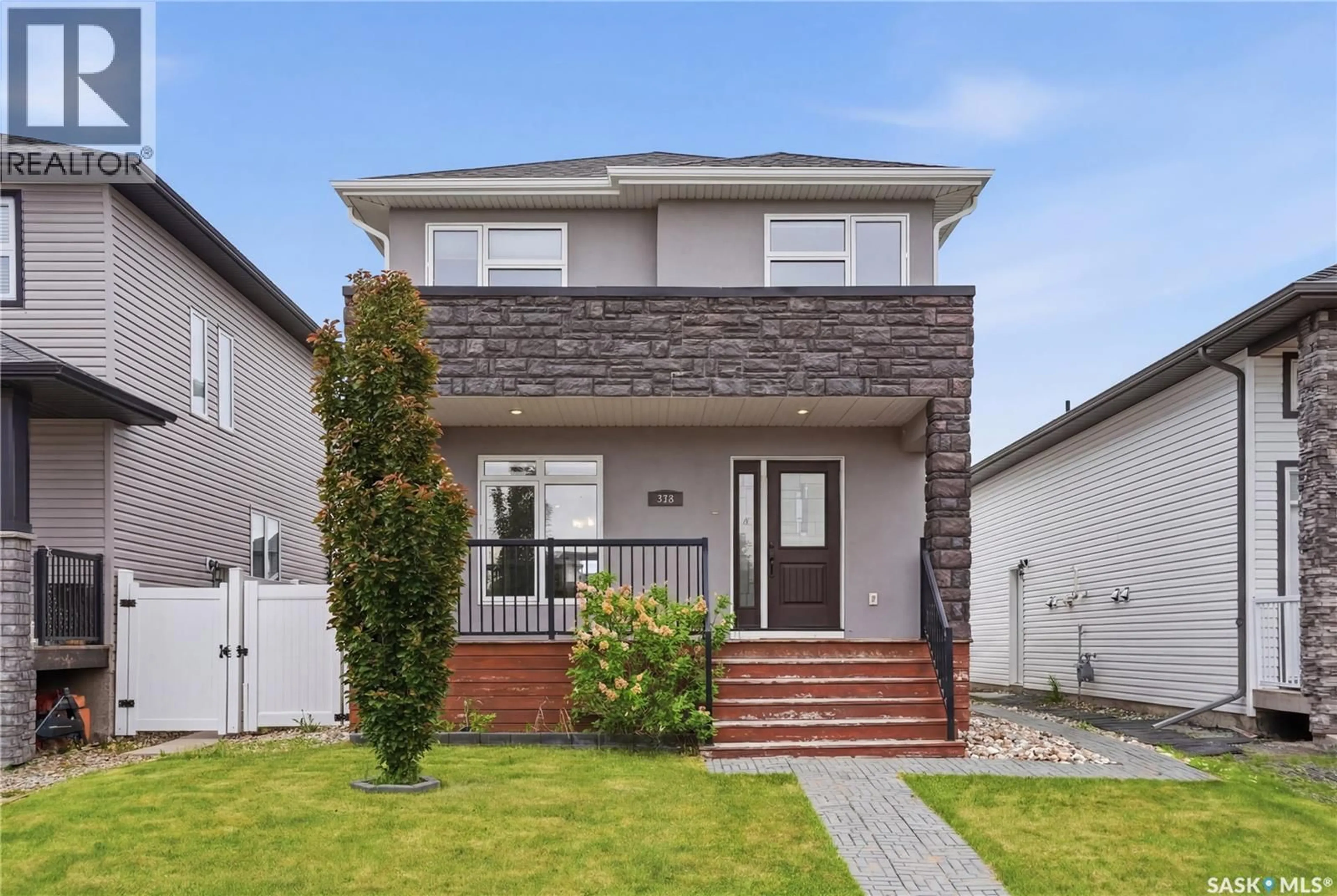 Home with brick exterior material, street for 543 EVERGREEN BOULEVARD, Saskatoon Saskatchewan S7W0L4