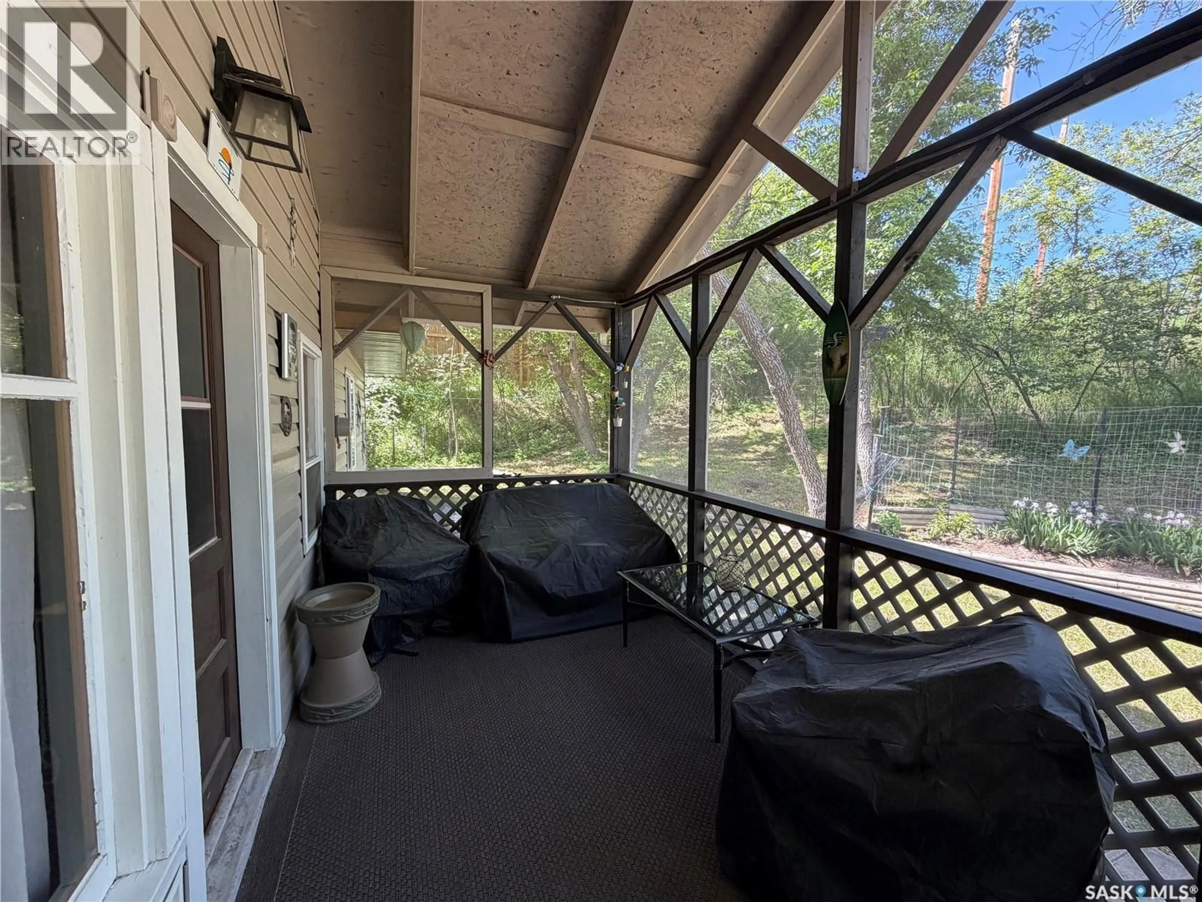 Patio, water/lake/river/ocean view for 825 TATANKA DRIVE, South Lake Saskatchewan S0H4C0