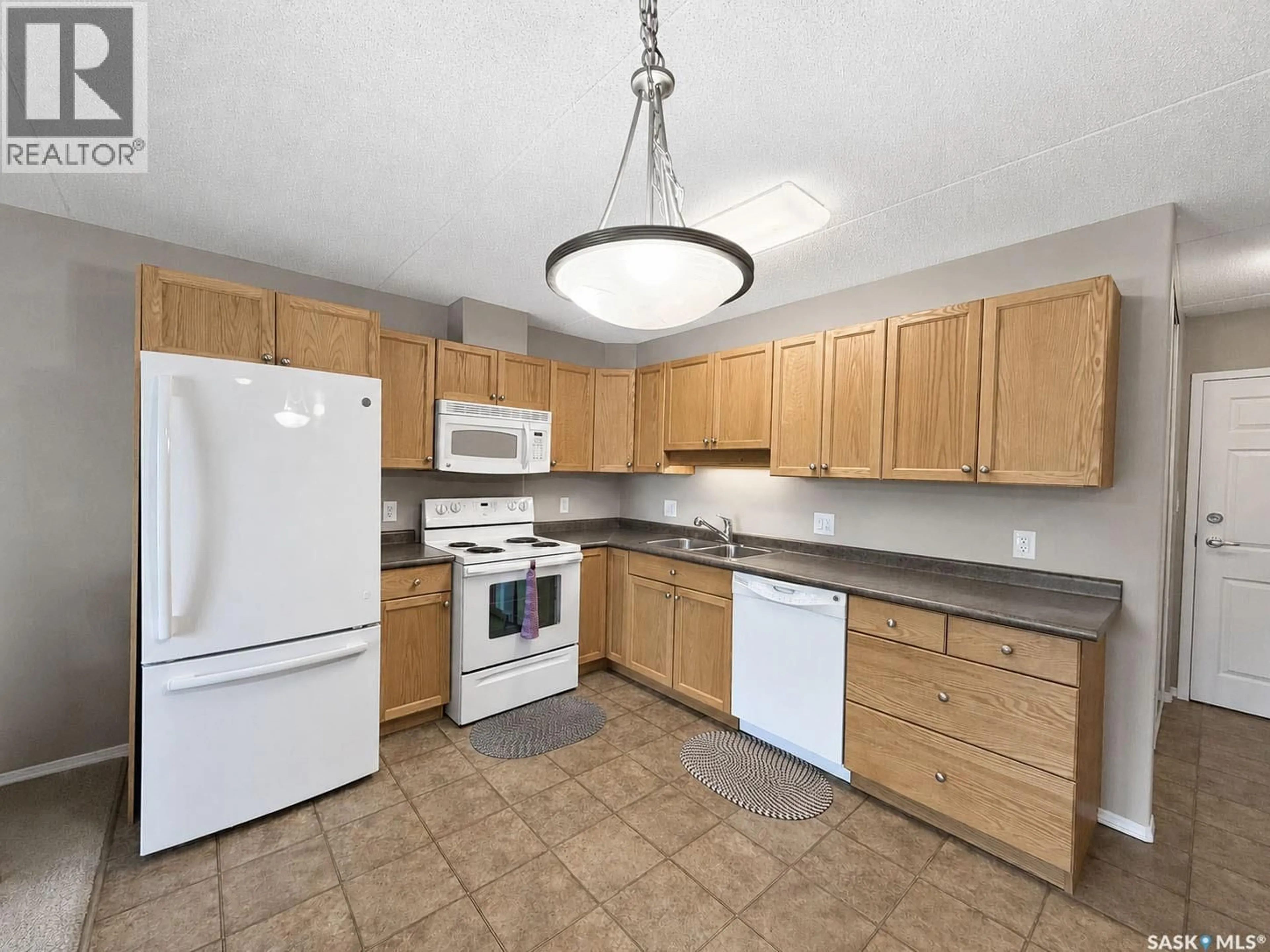 Unknown for 1/2 - 202 1901 1 AVENUE, Prince Albert Saskatchewan S6V5A8