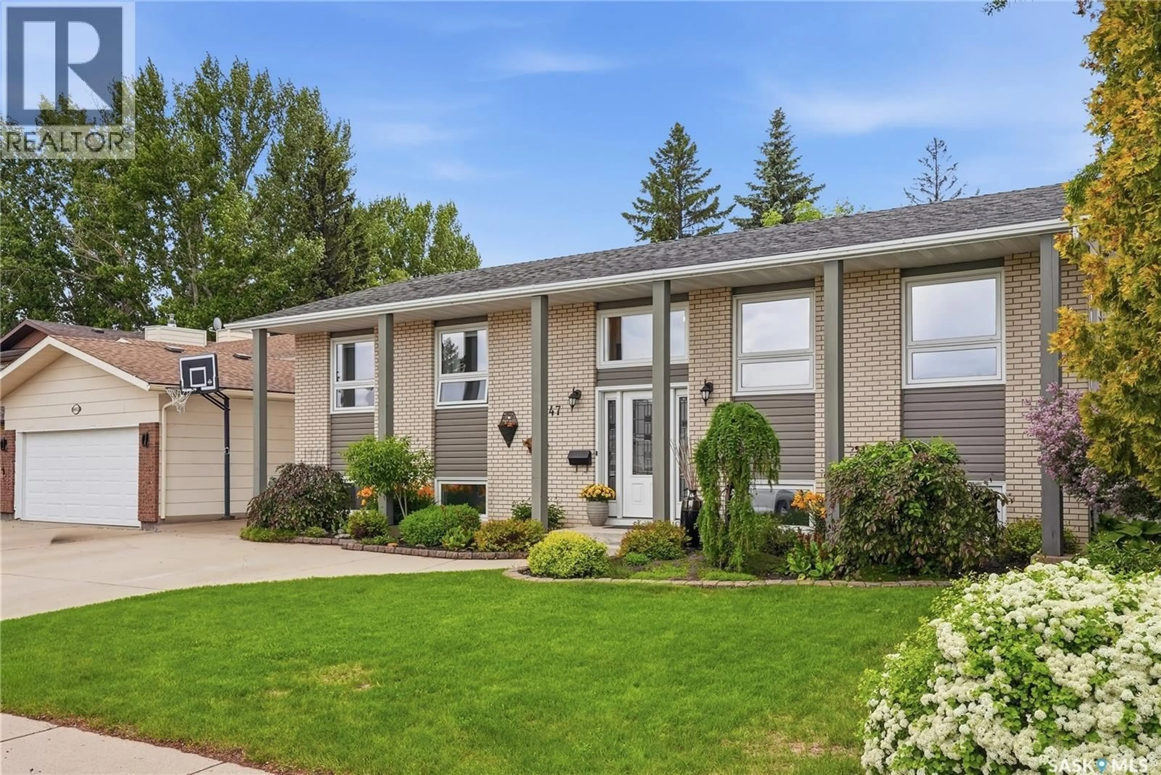 Home with vinyl exterior material, street for 447 BALL WAY, Saskatoon Saskatchewan S7K6E6
