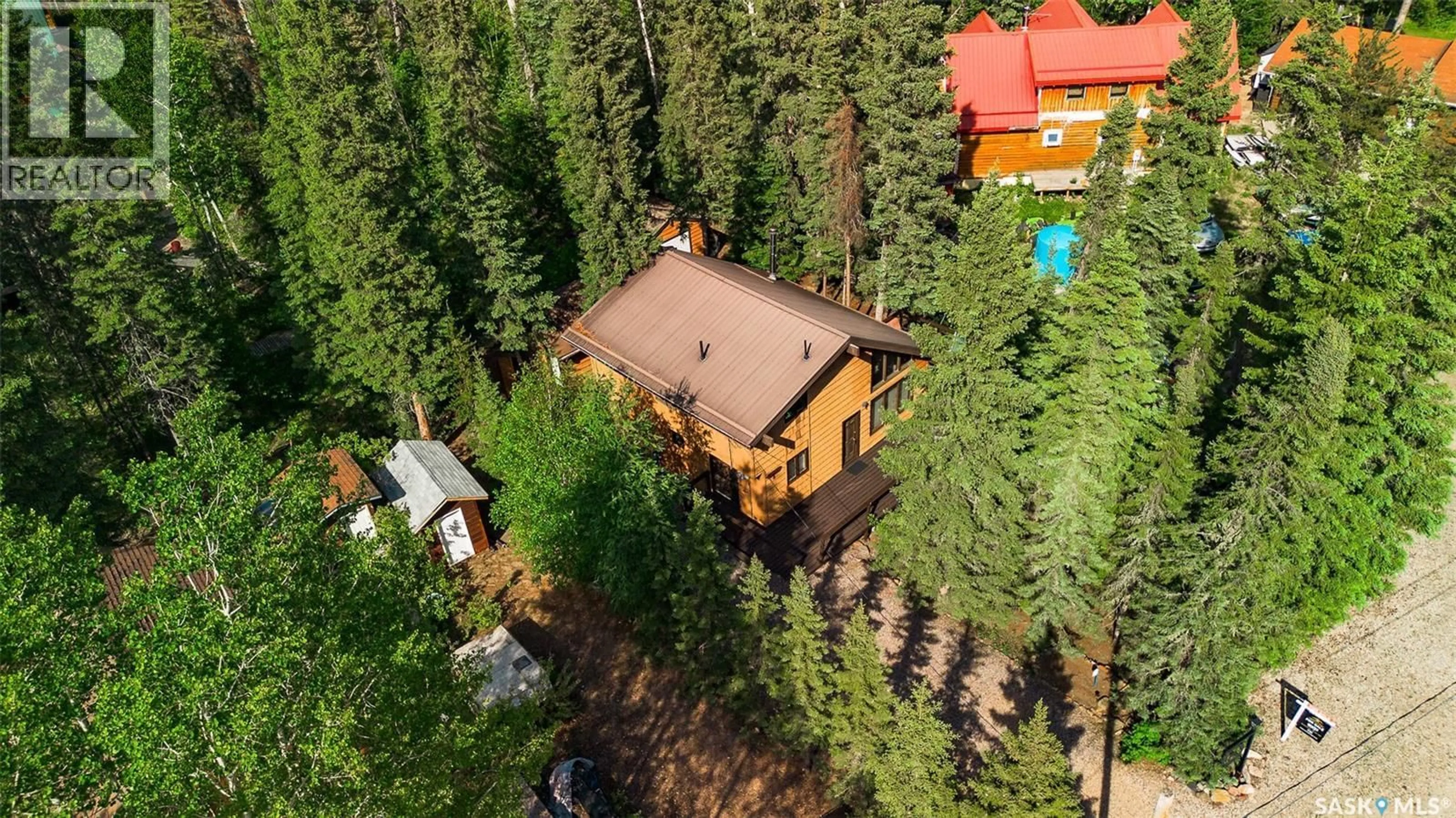 A pic from outside/outdoor area/front of a property/back of a property/a pic from drone, forest/trees view for Lot 8 BOBCAT PLACE, Northern Admin District Saskatchewan S0J0E3