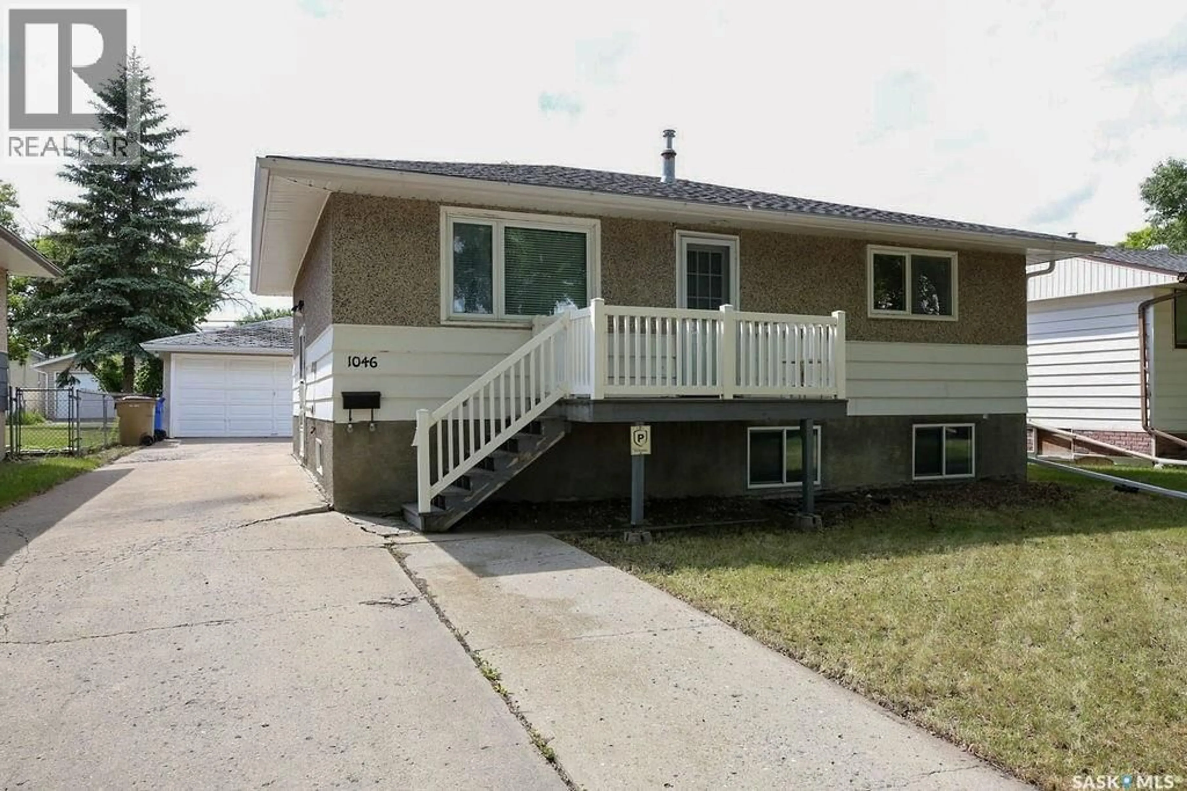Home with vinyl exterior material, street for 1046 LINDSAY STREET, Regina Saskatchewan S4N3A9