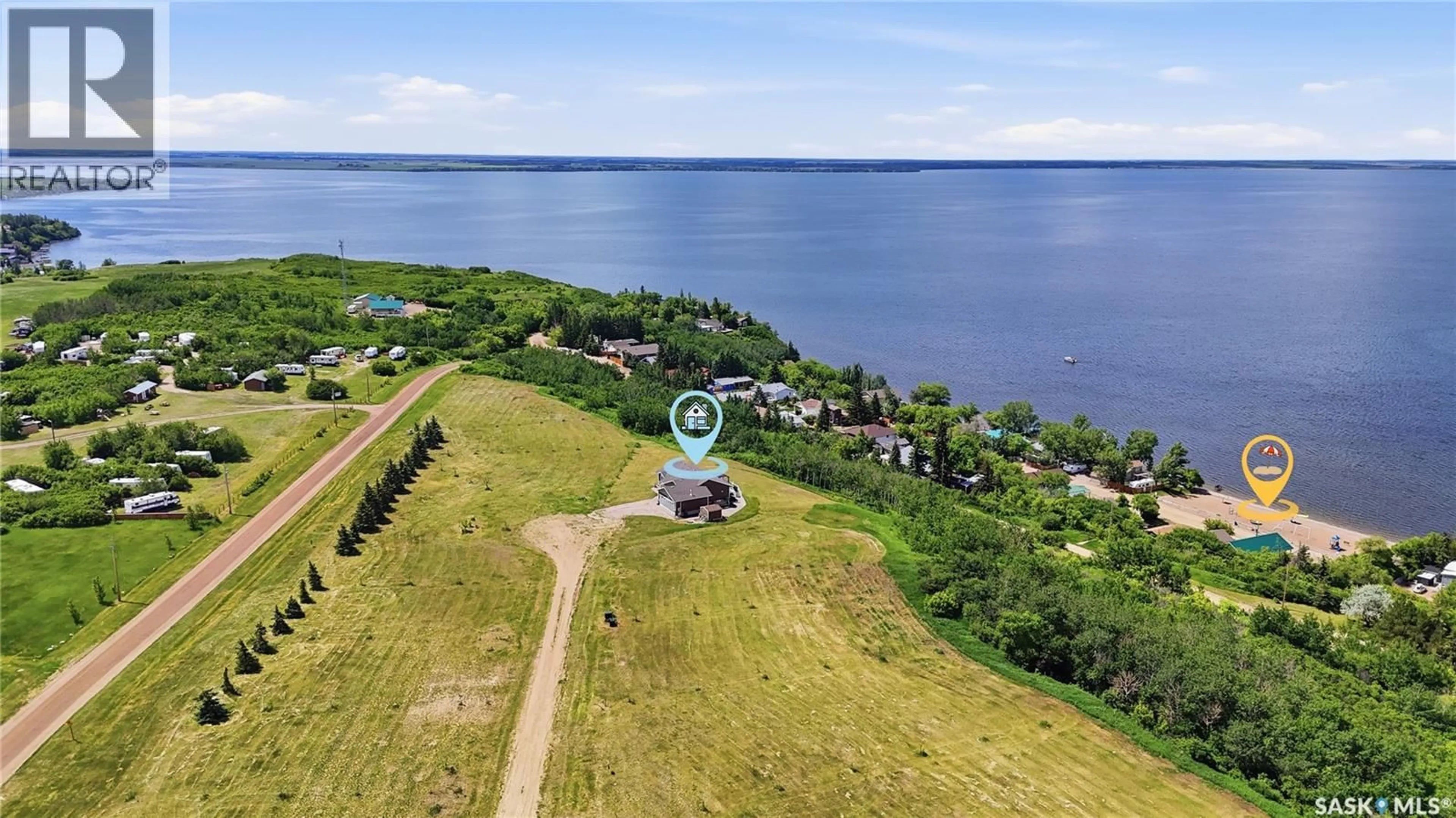 A pic from outside/outdoor area/front of a property/back of a property/a pic from drone, water/lake/river/ocean view for 380 CARTER CRESCENT, Cochin Saskatchewan S0M0L0