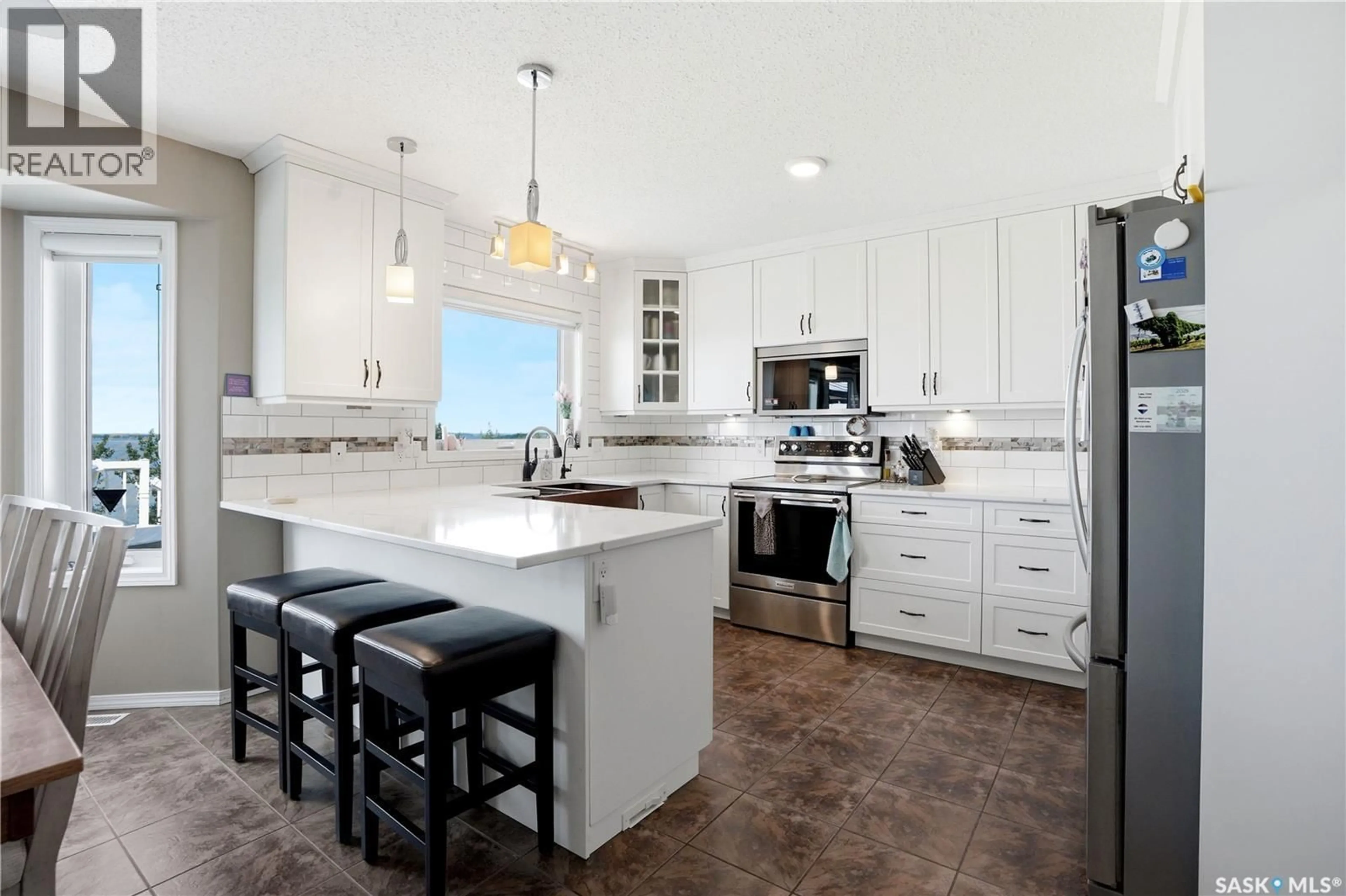 Open concept kitchen, ceramic/tile floor for 380 CARTER CRESCENT, Cochin Saskatchewan S0M0L0