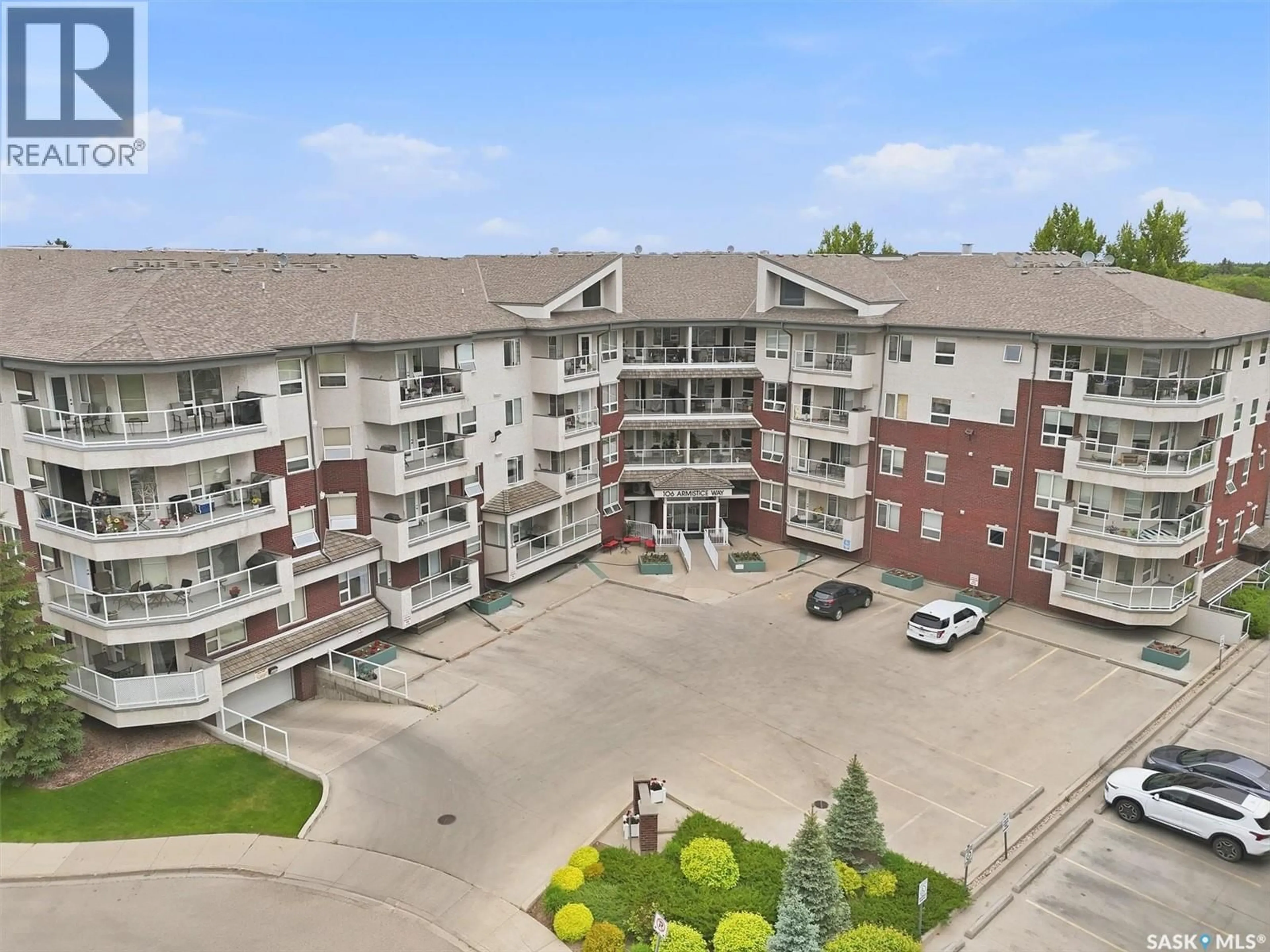 A pic from outside/outdoor area/front of a property/back of a property/a pic from drone, unknown for 106 - 215 ARMISTICE WAY, Saskatoon Saskatchewan S7J2H4