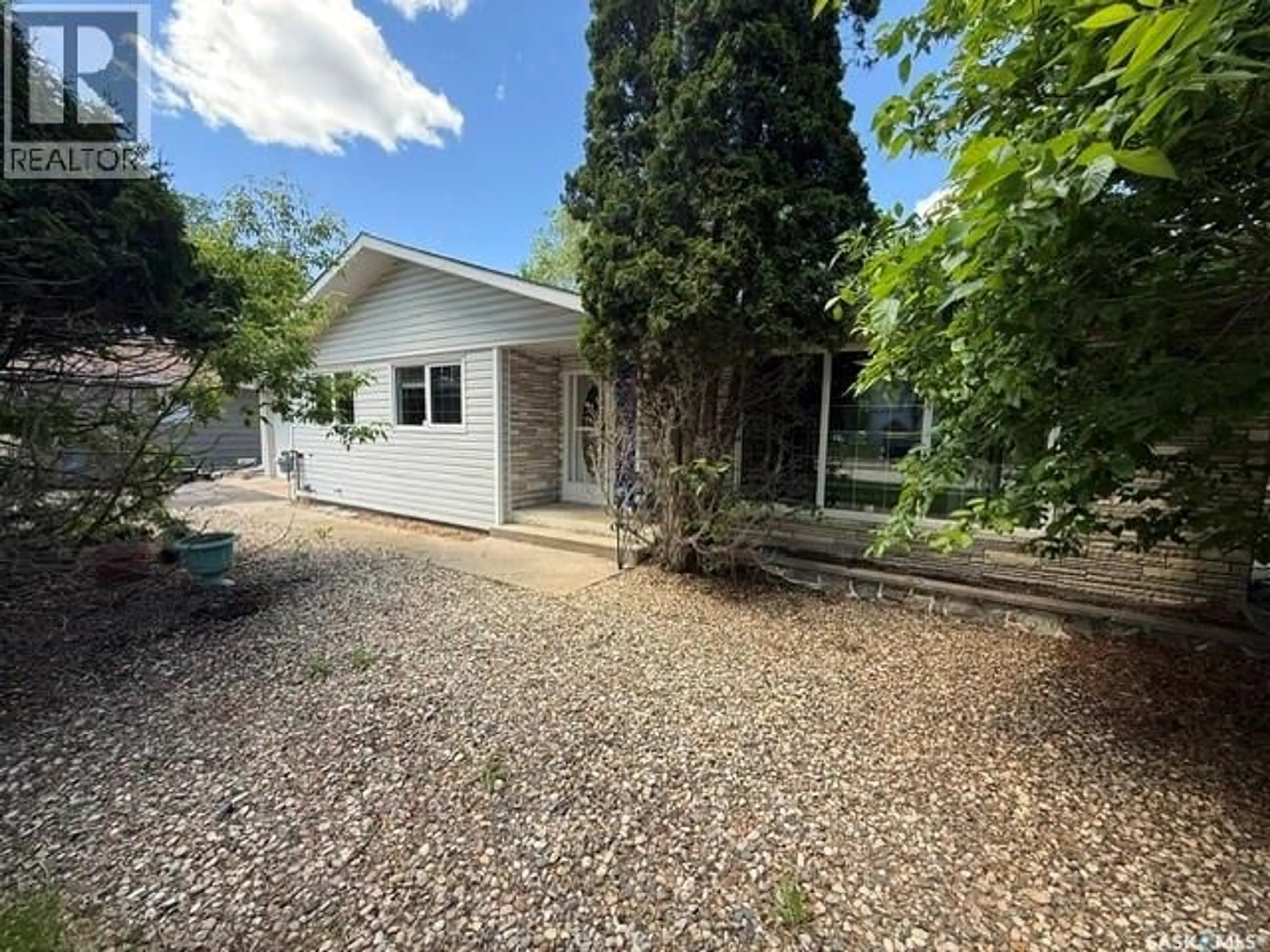 A pic from outside/outdoor area/front of a property/back of a property/a pic from drone, unknown for 245 QUEEN ELIZABETH BOULEVARD, Kamsack Saskatchewan S0A1S0