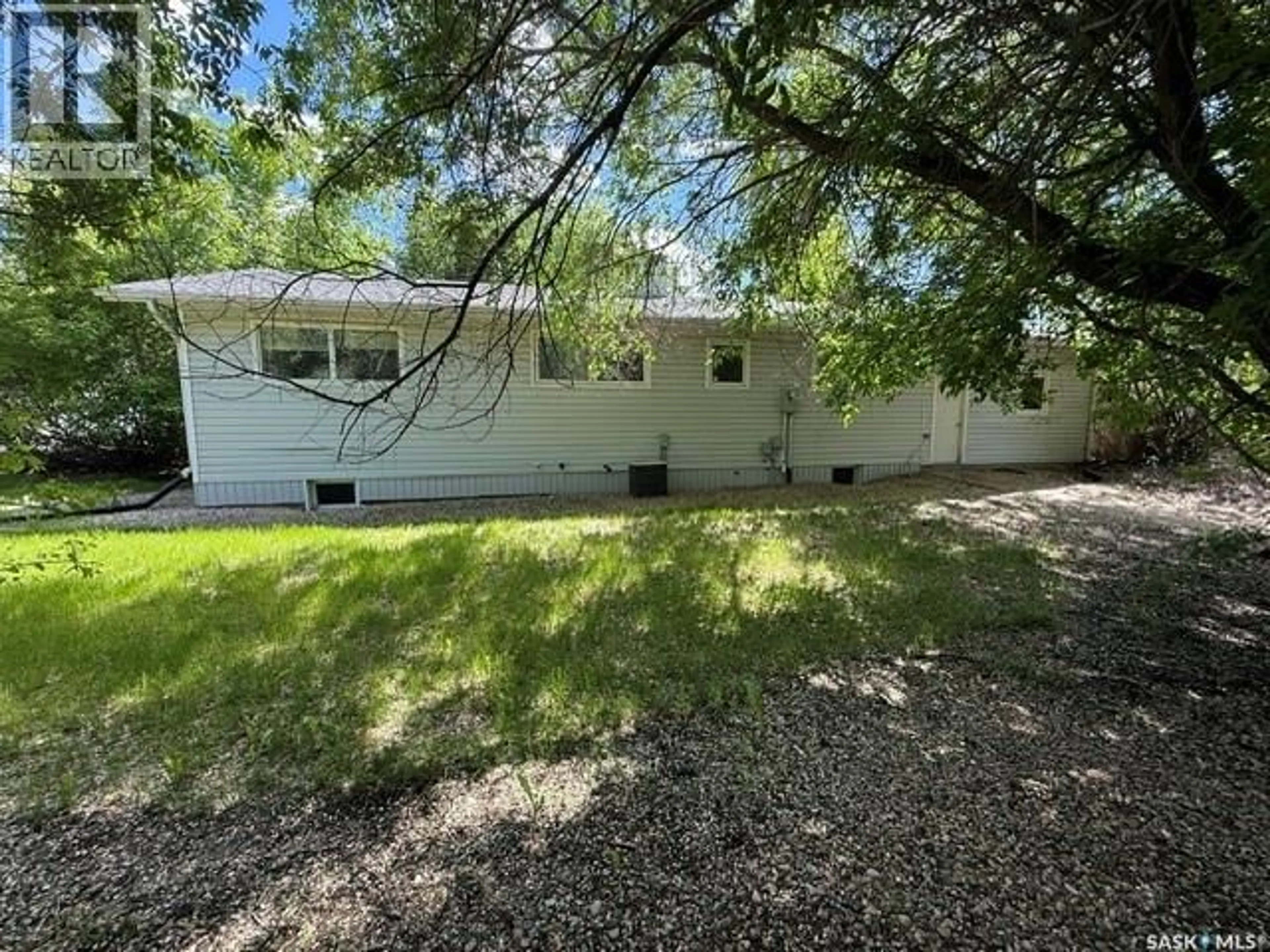 A pic from outside/outdoor area/front of a property/back of a property/a pic from drone, water/lake/river/ocean view for 245 QUEEN ELIZABETH BOULEVARD, Kamsack Saskatchewan S0A1S0