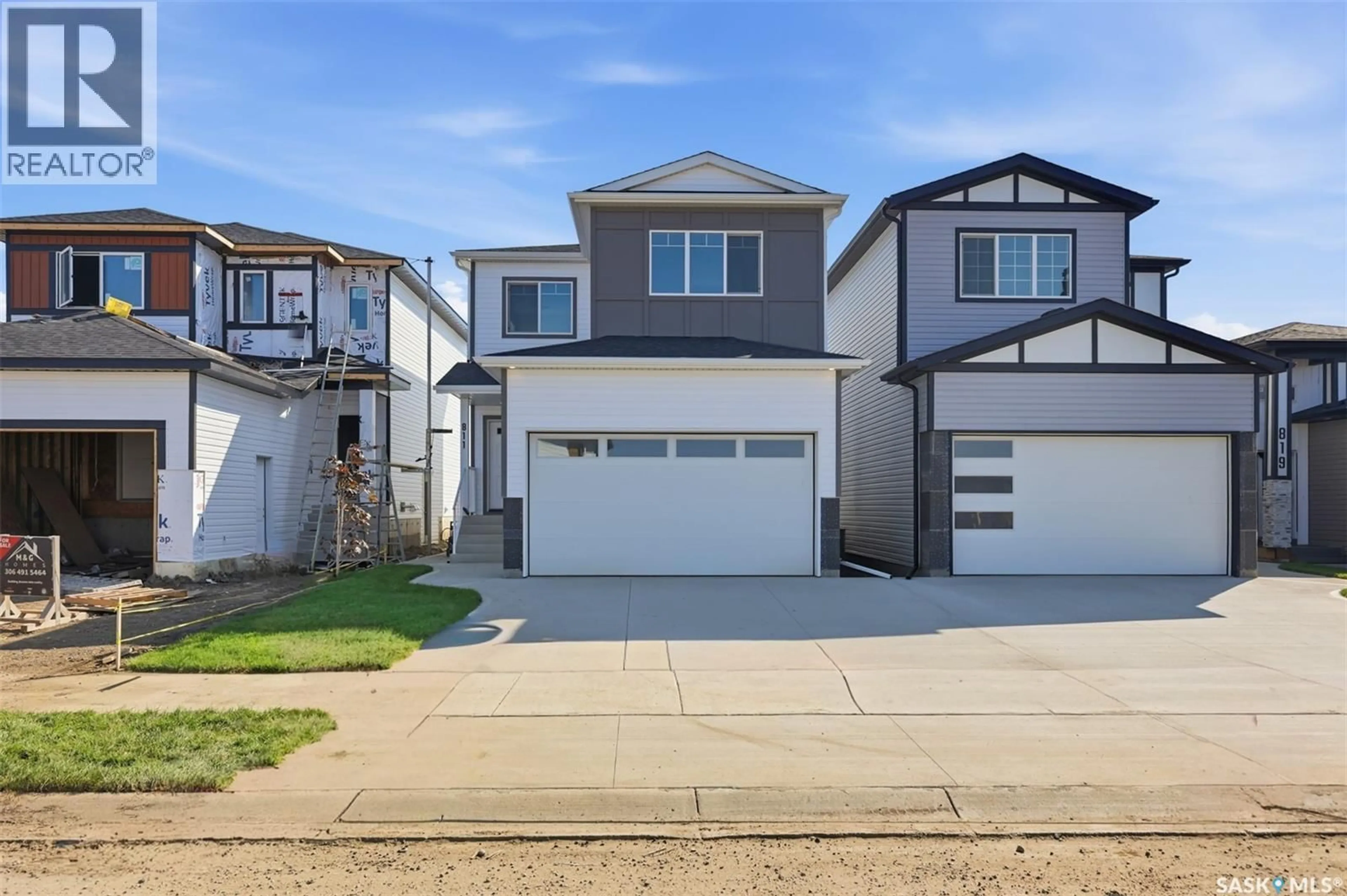 Home with vinyl exterior material, street for 811 BRIGHTON BOULEVARD, Saskatoon Saskatchewan S7V0Y4