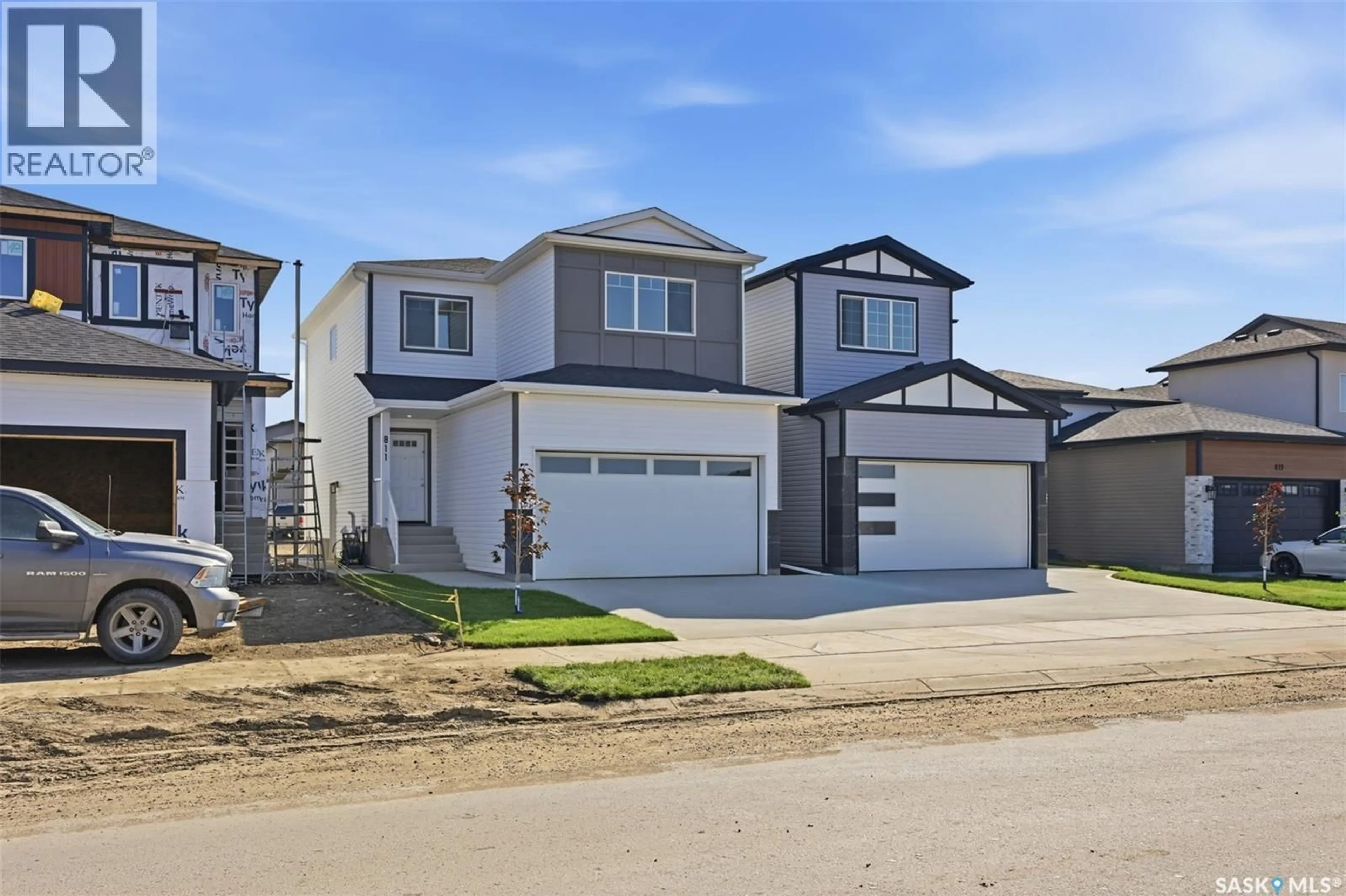 Home with vinyl exterior material, street for 811 BRIGHTON BOULEVARD, Saskatoon Saskatchewan S7V0Y4