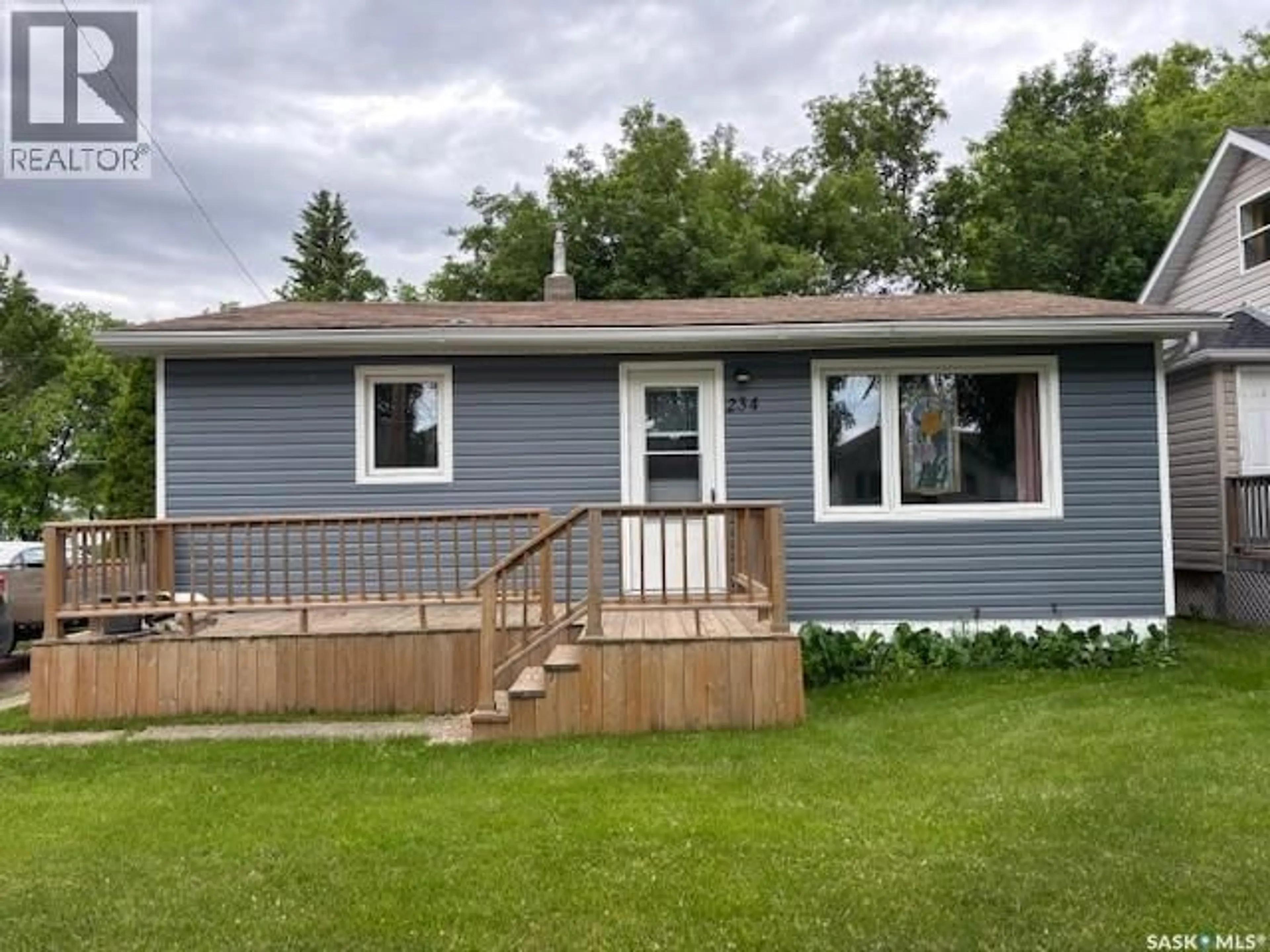 Home with vinyl exterior material, street for 234 3RD AVENUE, Canora Saskatchewan S0A0L0