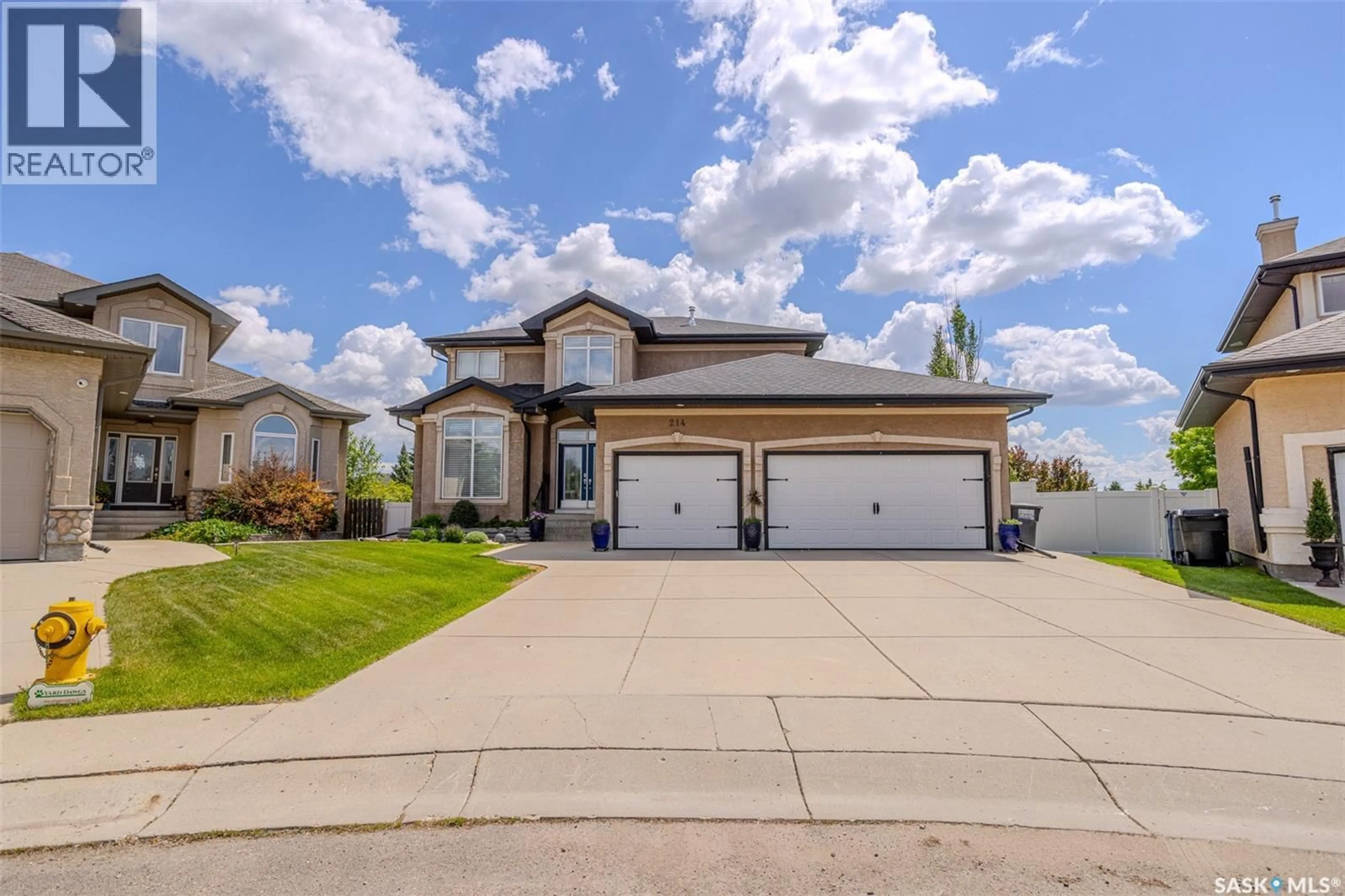 Home with vinyl exterior material, street for 214 BAYFIELD PLACE, Saskatoon Saskatchewan S7V1E3