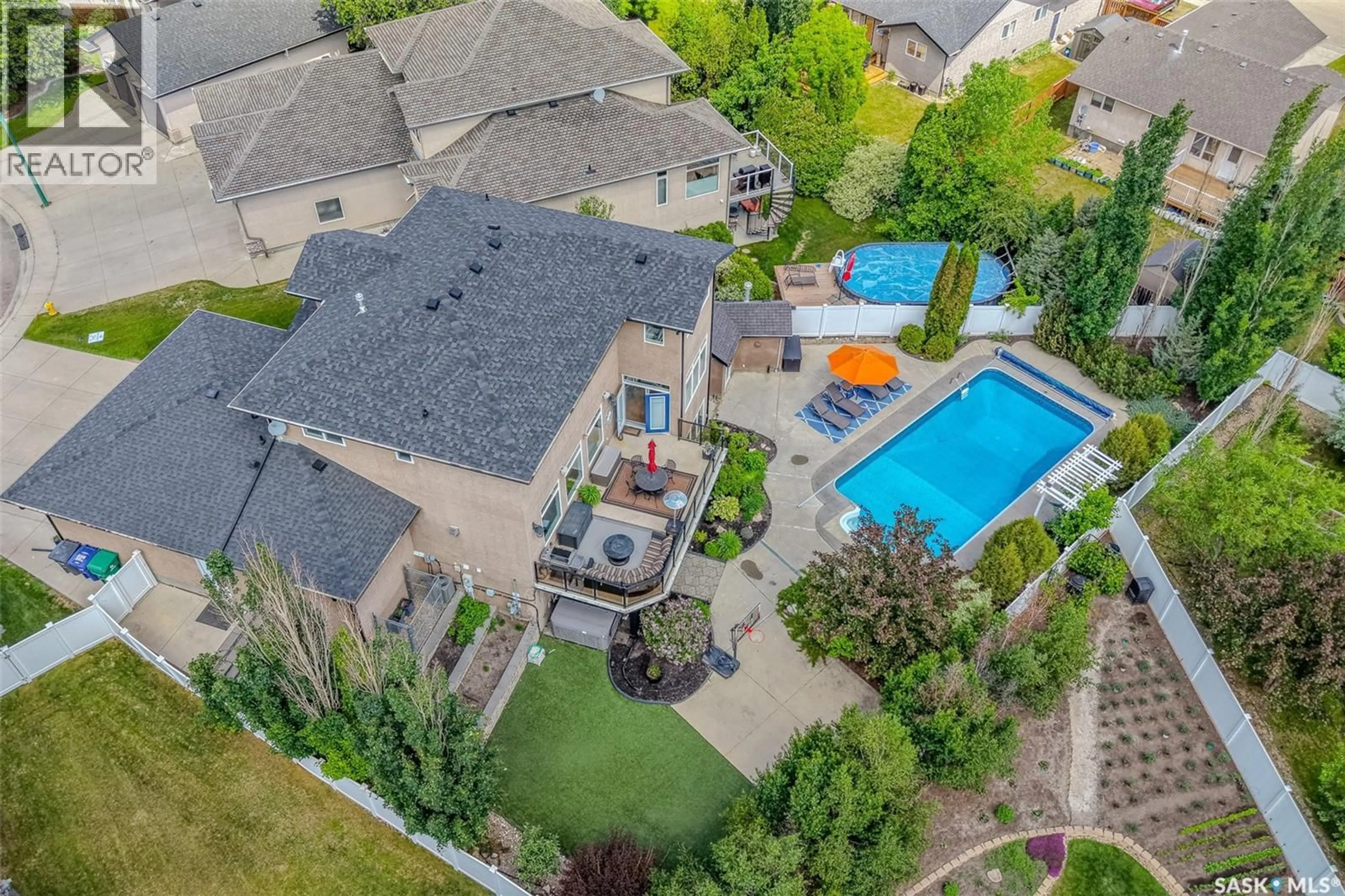 A pic from outside/outdoor area/front of a property/back of a property/a pic from drone, mountain view for 214 BAYFIELD PLACE, Saskatoon Saskatchewan S7V1E3