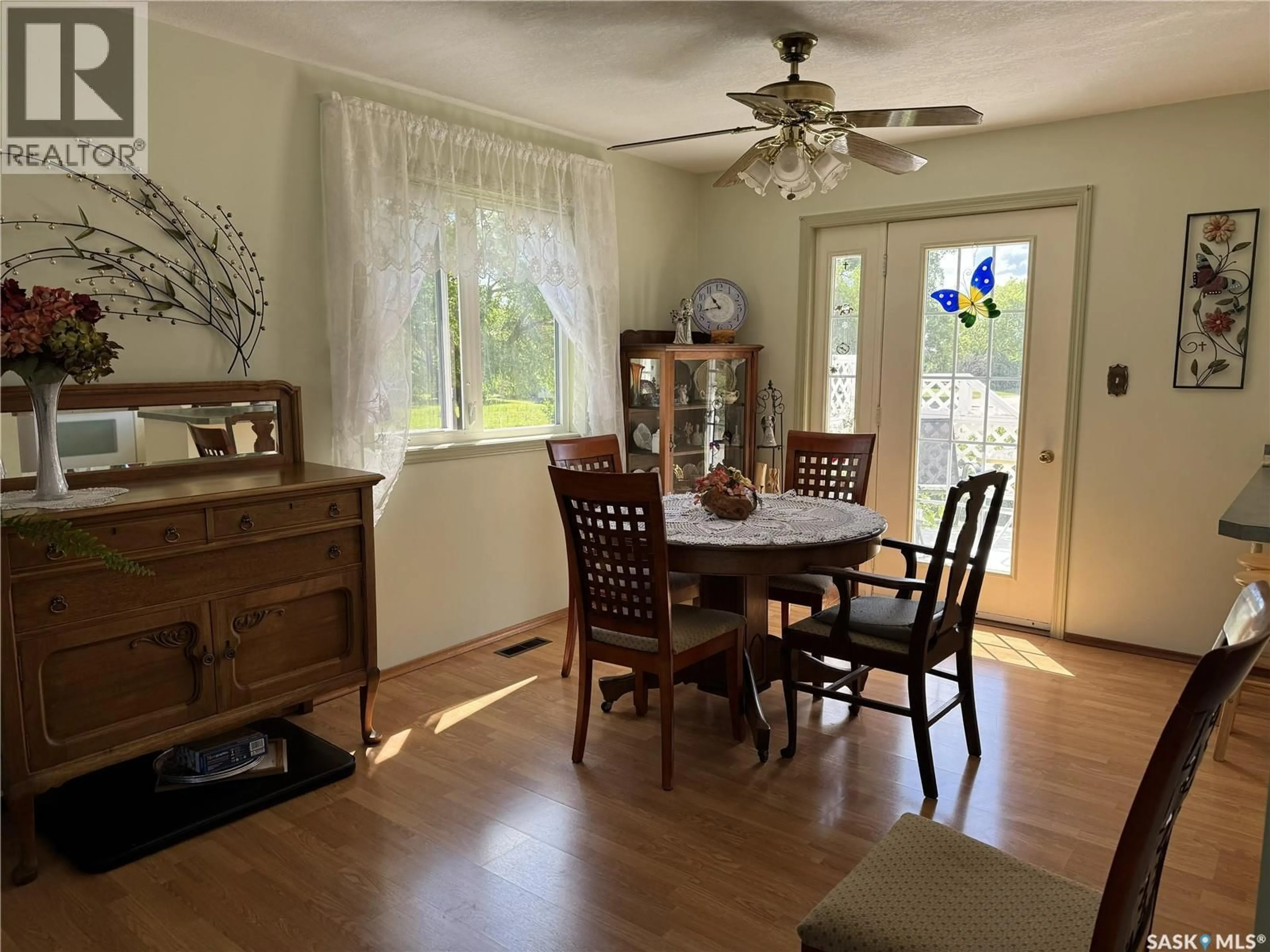 Dining room, wood/laminate floor for 107 DOWNEY STREET, Strasbourg Saskatchewan S0G4V0