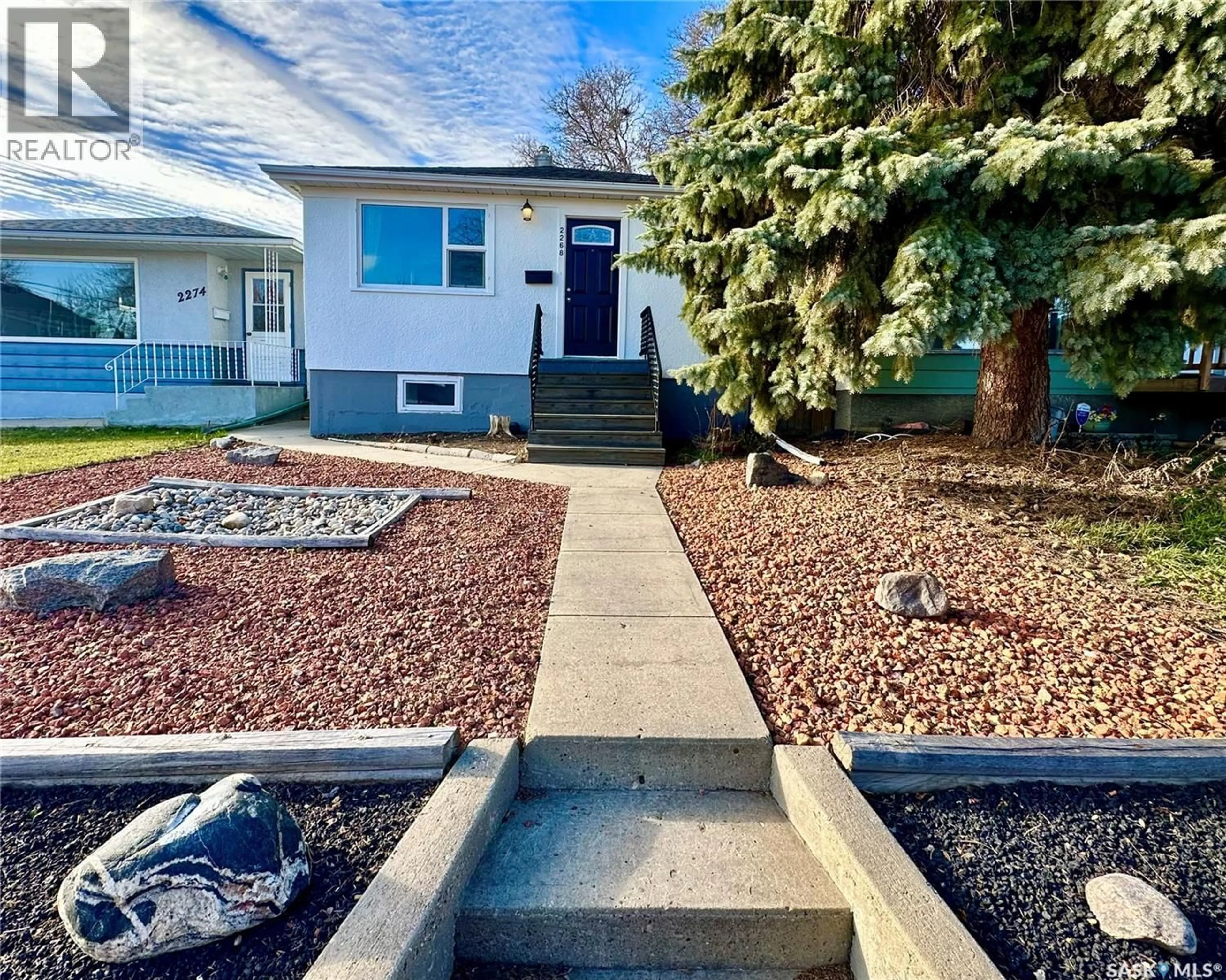 Home with vinyl exterior material, street for 2268 BRODER STREET, Regina Saskatchewan S4N3S6