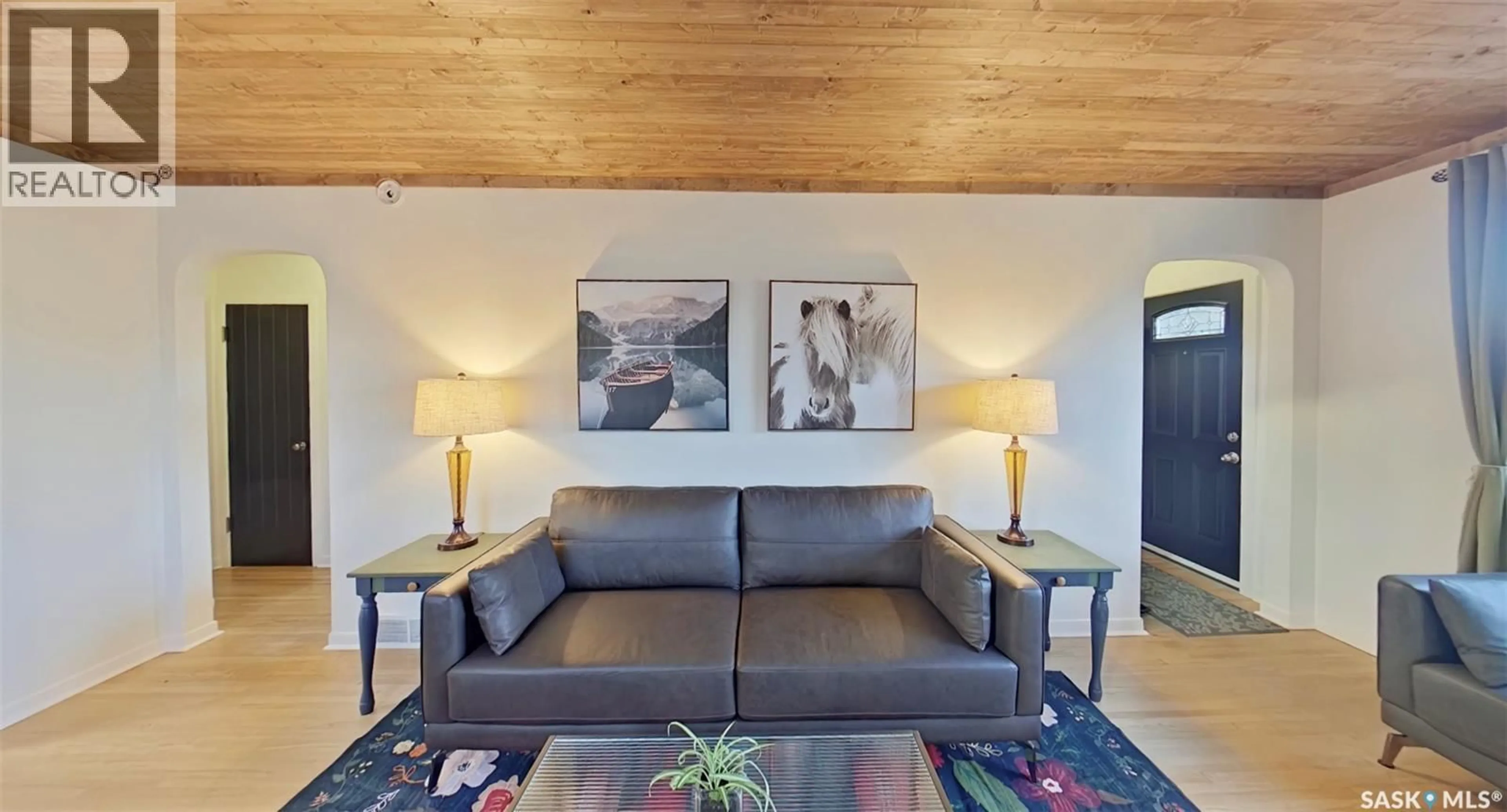 Living room with furniture, wood/laminate floor for 2268 BRODER STREET, Regina Saskatchewan S4N3S6