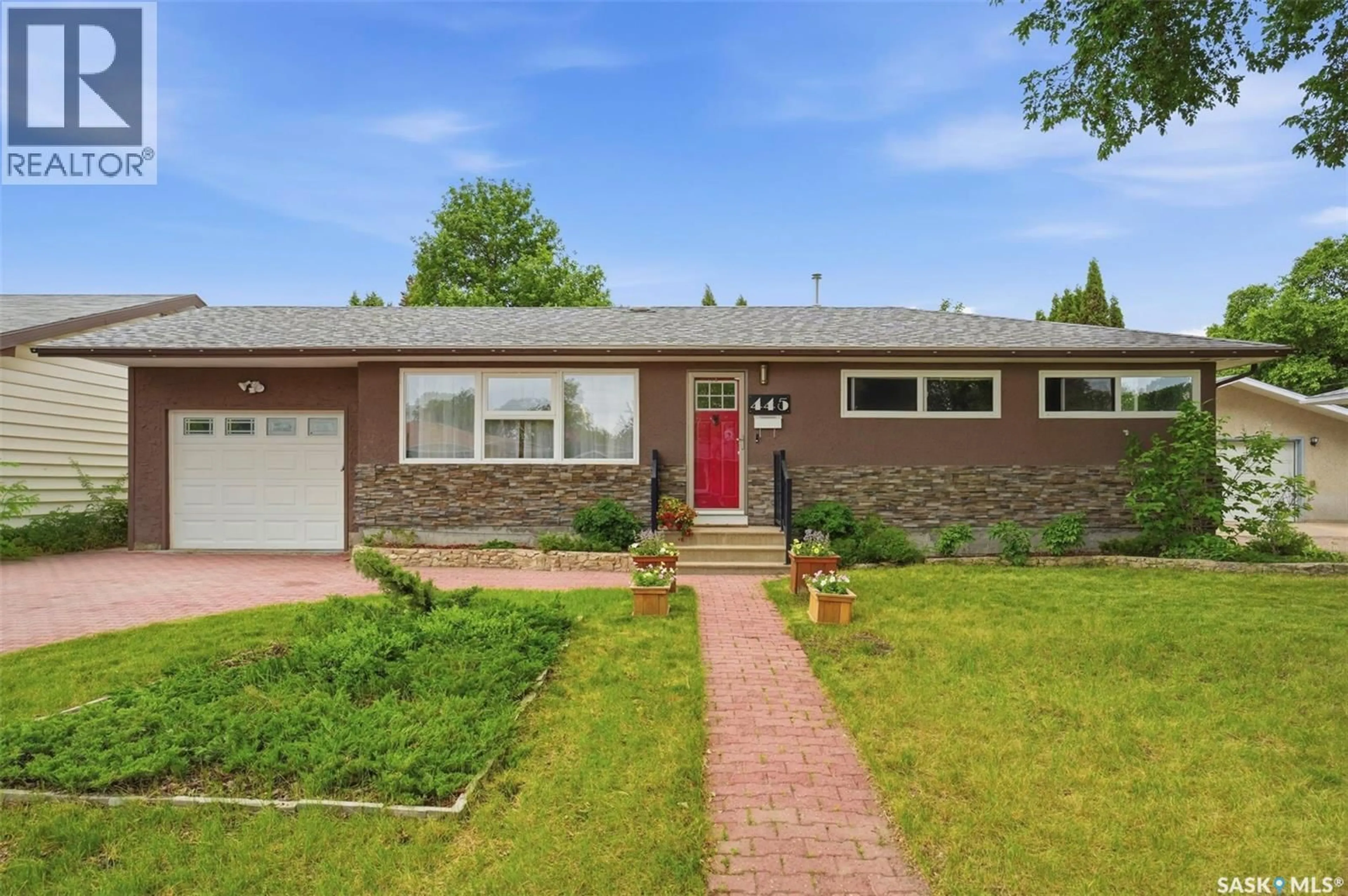Home with brick exterior material, street for 445 WITNEY AVENUE, Saskatoon Saskatchewan S7M3K6