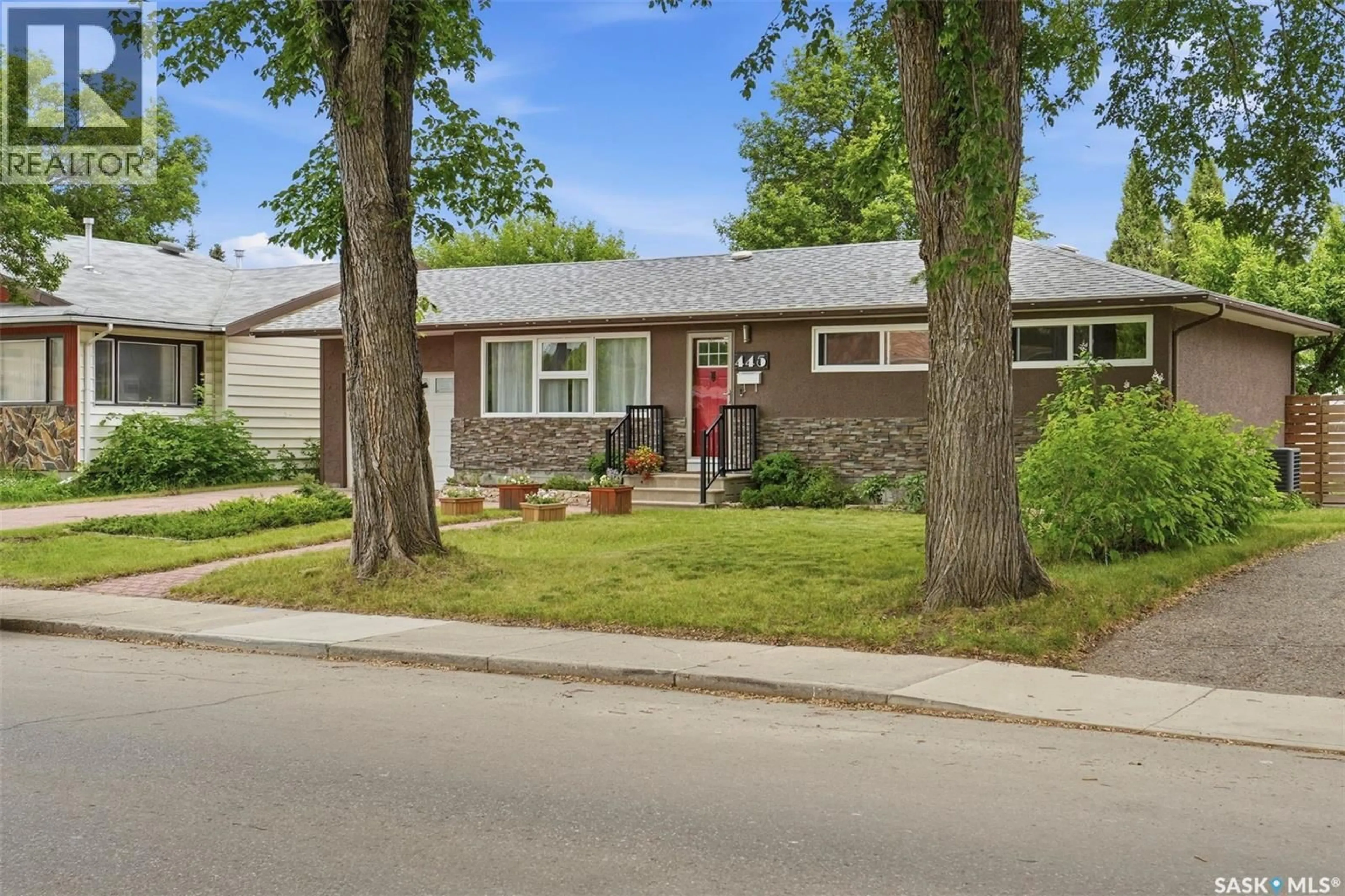 Home with brick exterior material, street for 445 WITNEY AVENUE, Saskatoon Saskatchewan S7M3K6