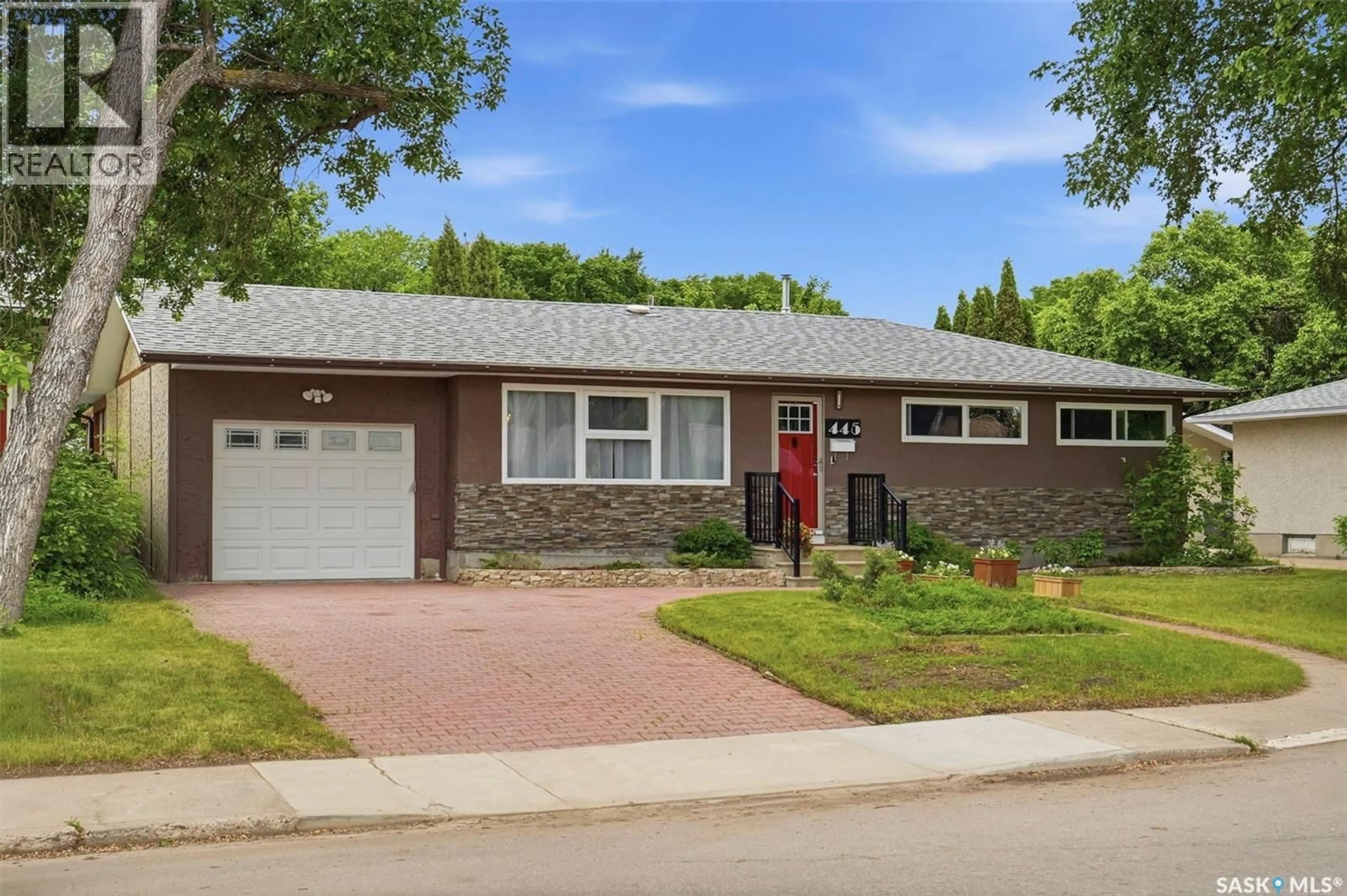 Home with brick exterior material, street for 445 WITNEY AVENUE, Saskatoon Saskatchewan S7M3K6