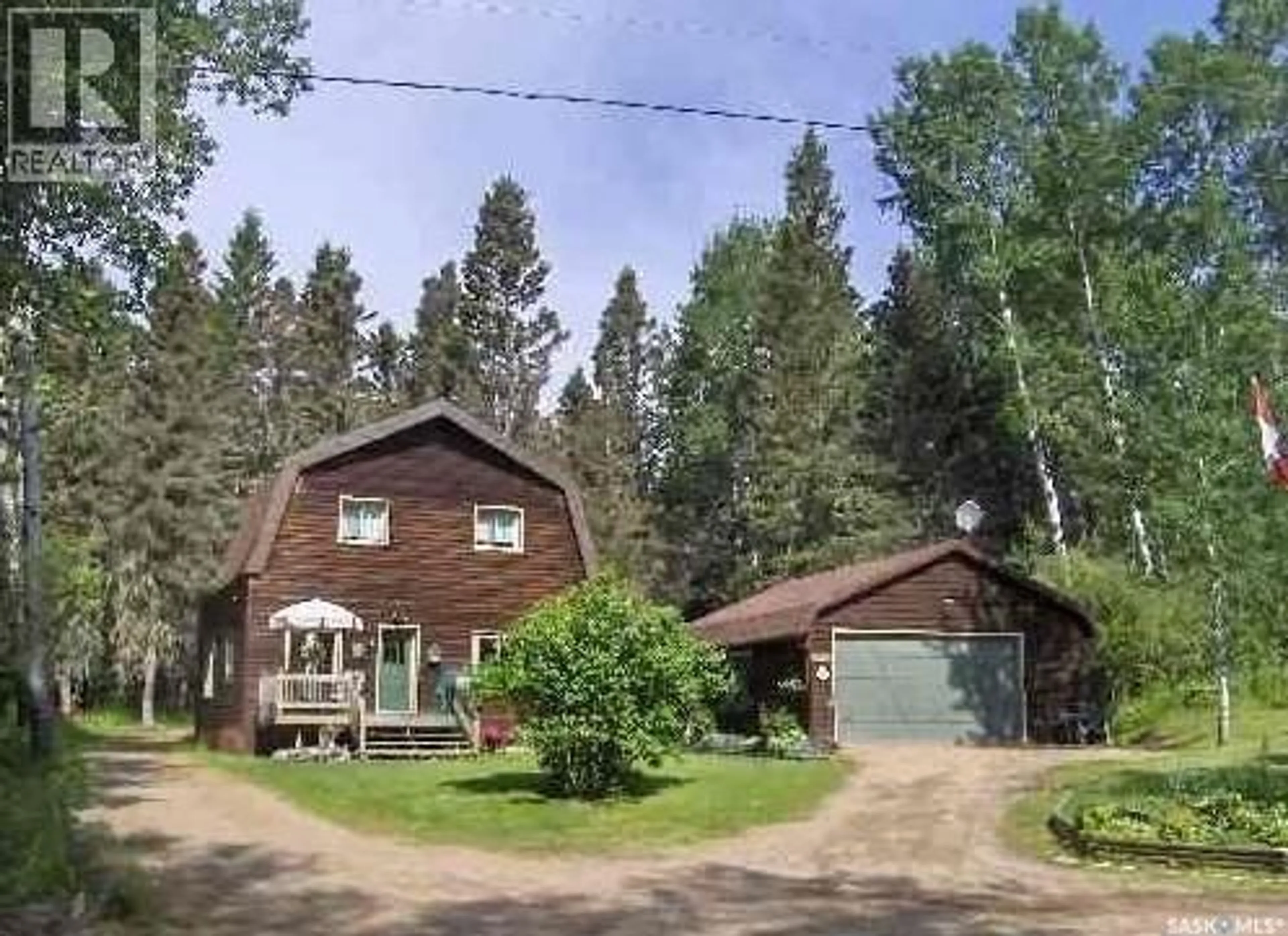 A pic from outside/outdoor area/front of a property/back of a property/a pic from drone, unknown for 110 DEER CRES, McPhee Lake Saskatchewan S0J0N0