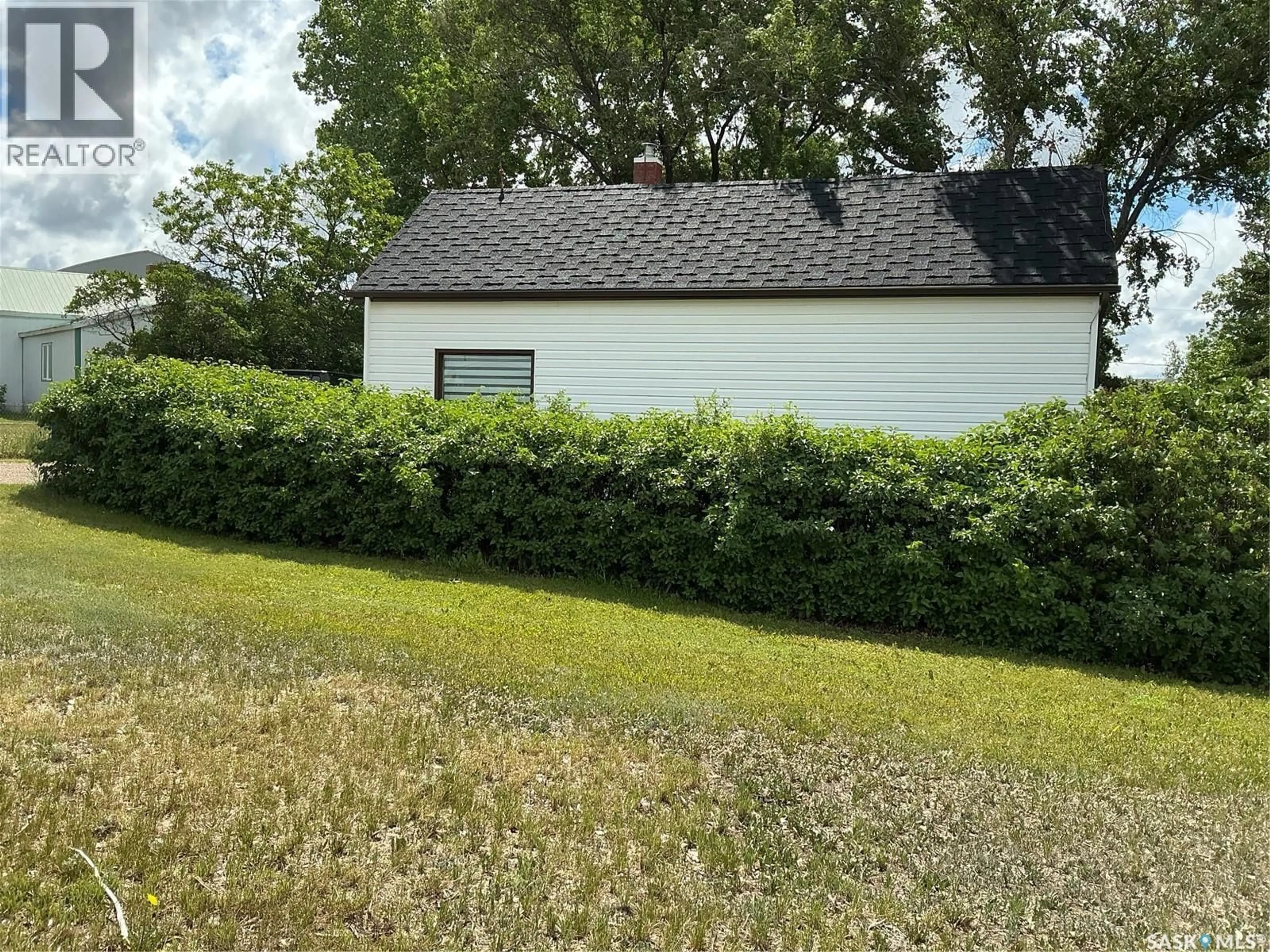 A pic from outside/outdoor area/front of a property/back of a property/a pic from drone, unknown for 325 CENTRE STREET, Coronach Saskatchewan S0H0Z0