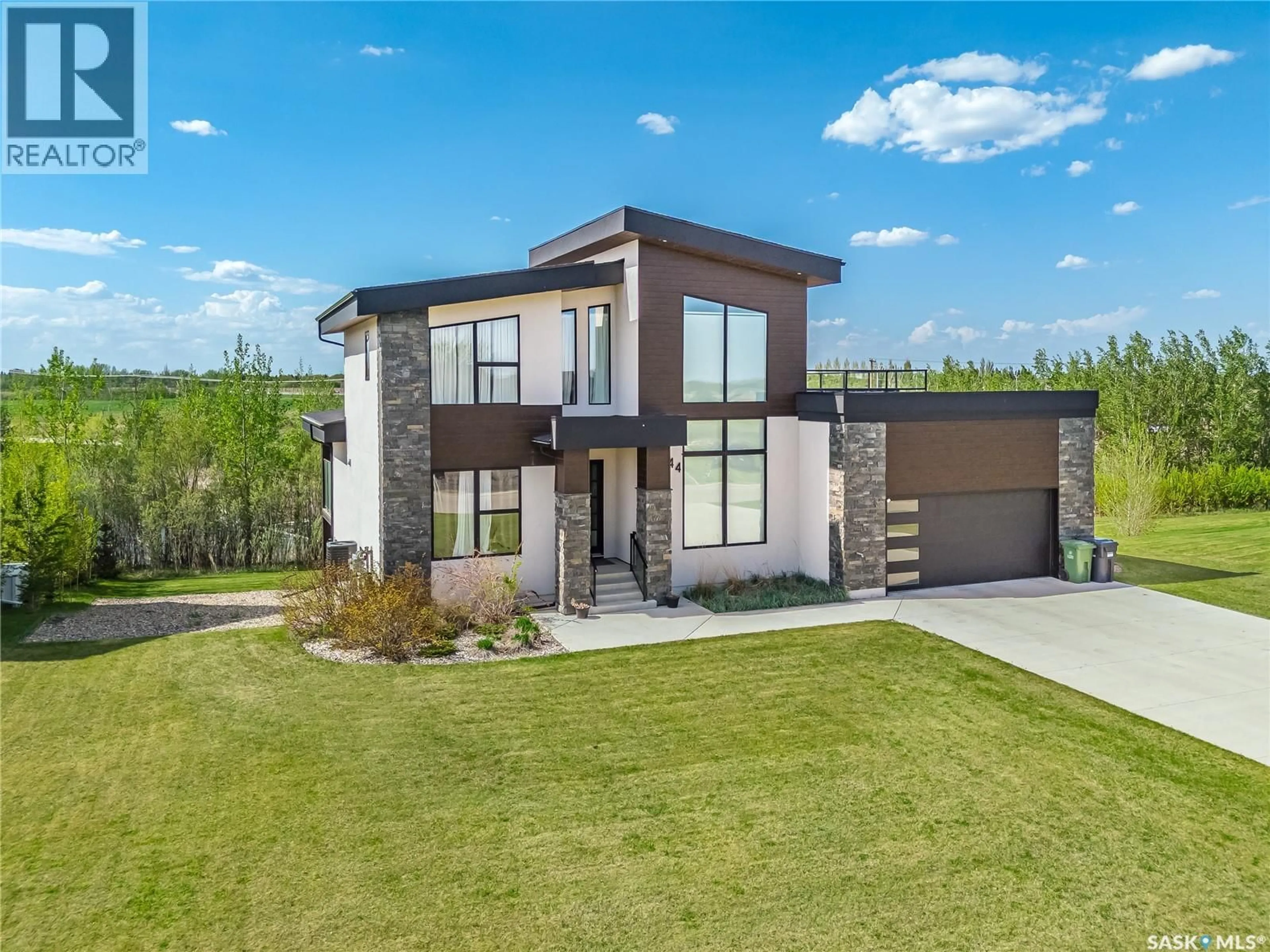 Home with brick exterior material, street for 144 GREENBRYRE STREET, Corman Park Rm No. 344 Saskatchewan S7V0J6