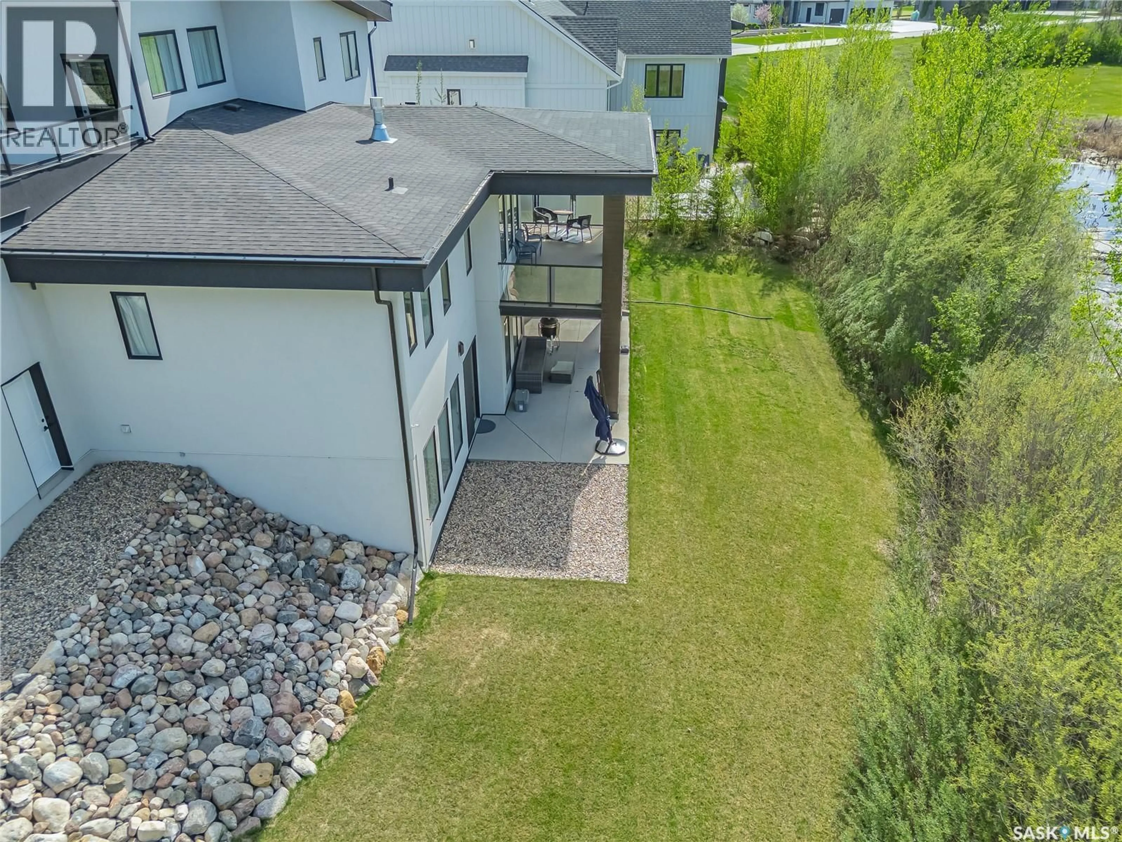 A pic from outside/outdoor area/front of a property/back of a property/a pic from drone, unknown for 144 GREENBRYRE STREET, Corman Park Rm No. 344 Saskatchewan S7V0J6