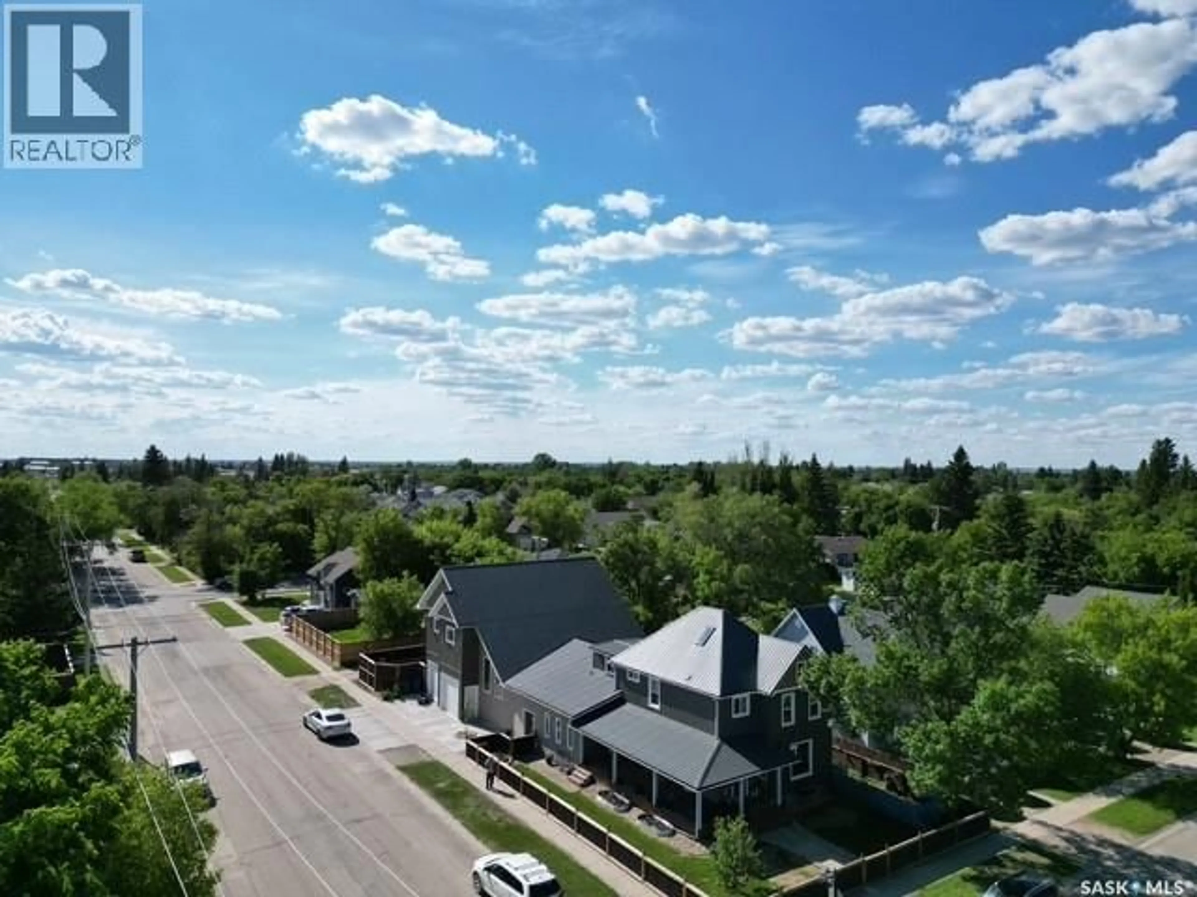 A pic from outside/outdoor area/front of a property/back of a property/a pic from drone, unknown for 701 10TH STREET, Humboldt Saskatchewan S0K2A0