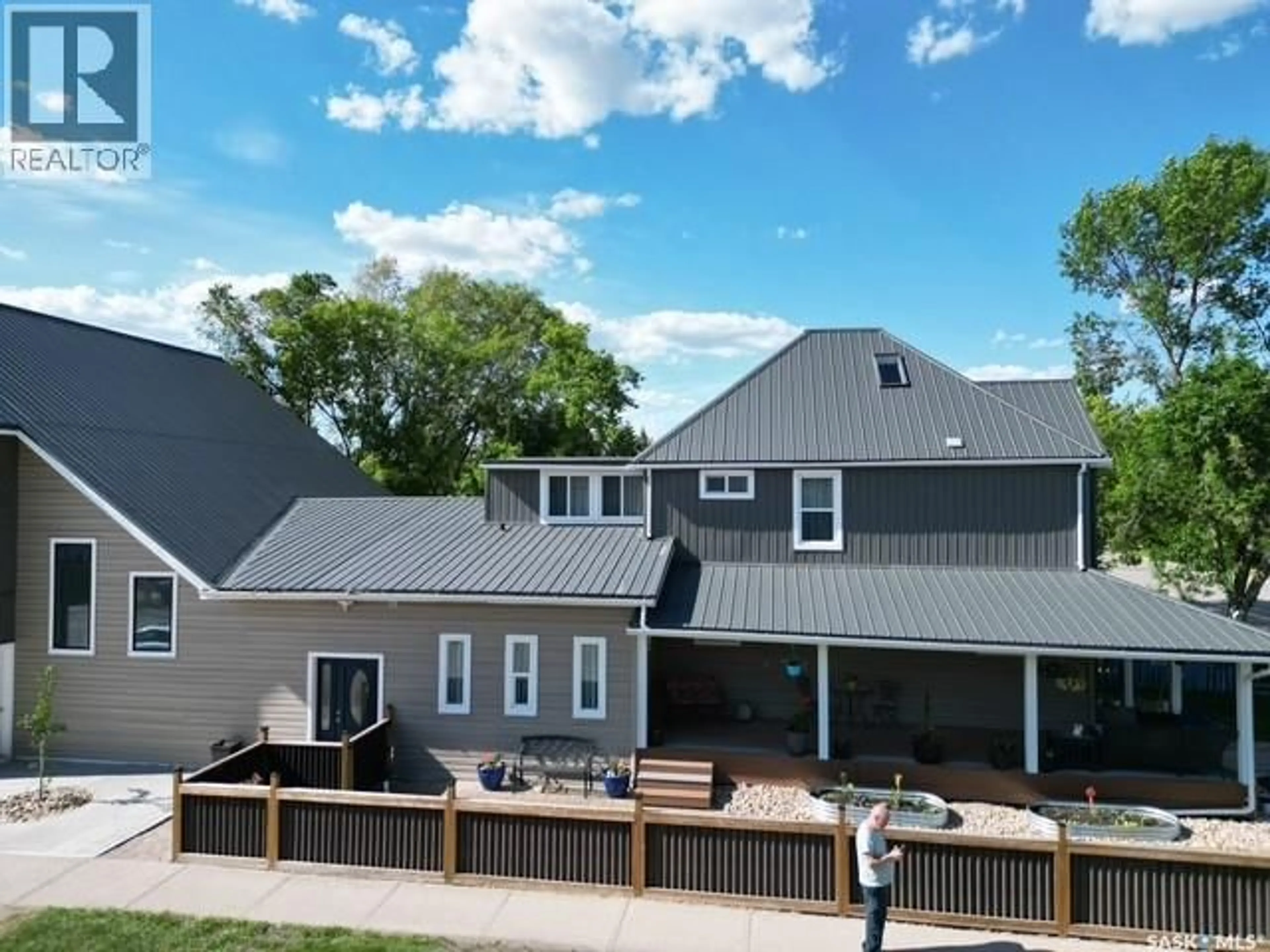 A pic from outside/outdoor area/front of a property/back of a property/a pic from drone, unknown for 701 10TH STREET, Humboldt Saskatchewan S0K2A0