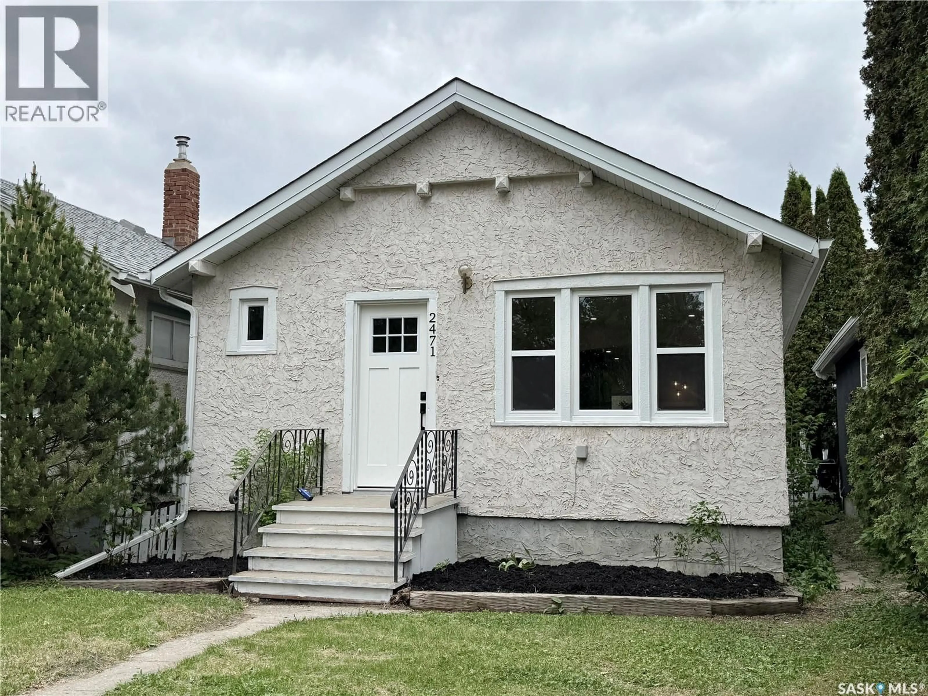 Home with brick exterior material, street for 2471 BRODER STREET, Regina Saskatchewan S4N3T1
