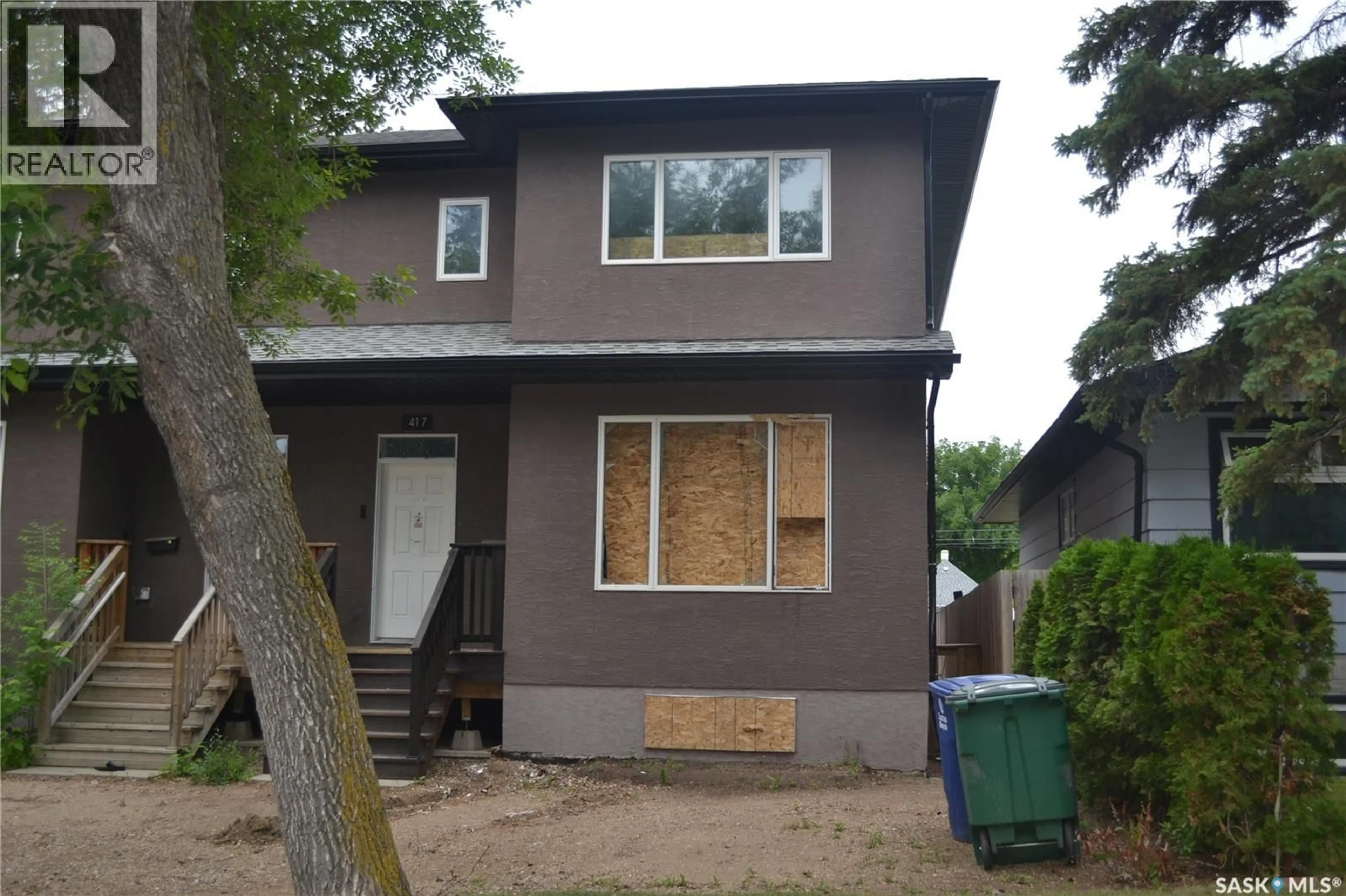 Home with vinyl exterior material, street for 417 S AVENUE S, Saskatoon Saskatchewan S7M3A3
