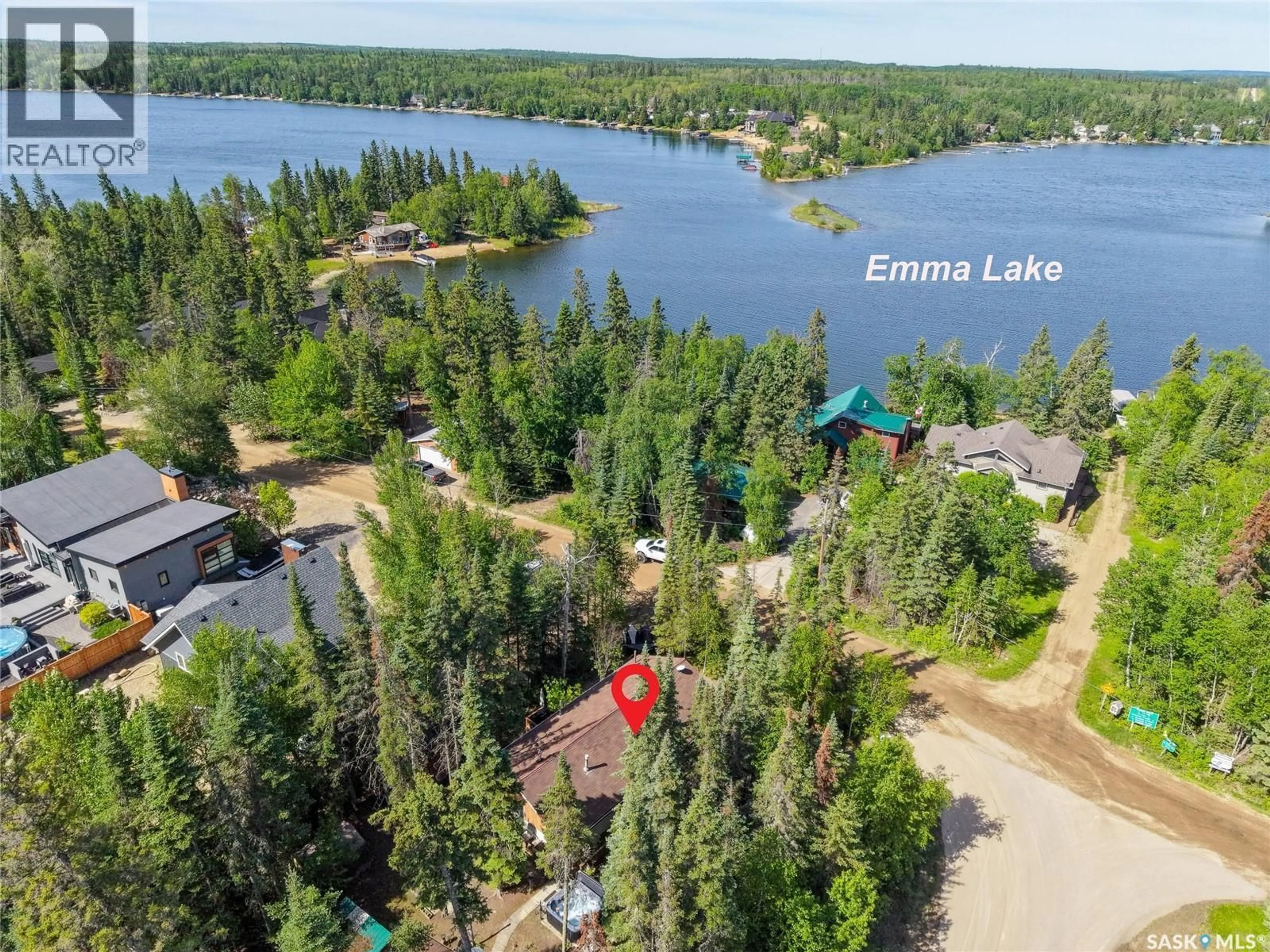 A pic from outside/outdoor area/front of a property/back of a property/a pic from drone, water/lake/river/ocean view for 619 MARINE DRIVE, Emma Lake Saskatchewan S0J0N0